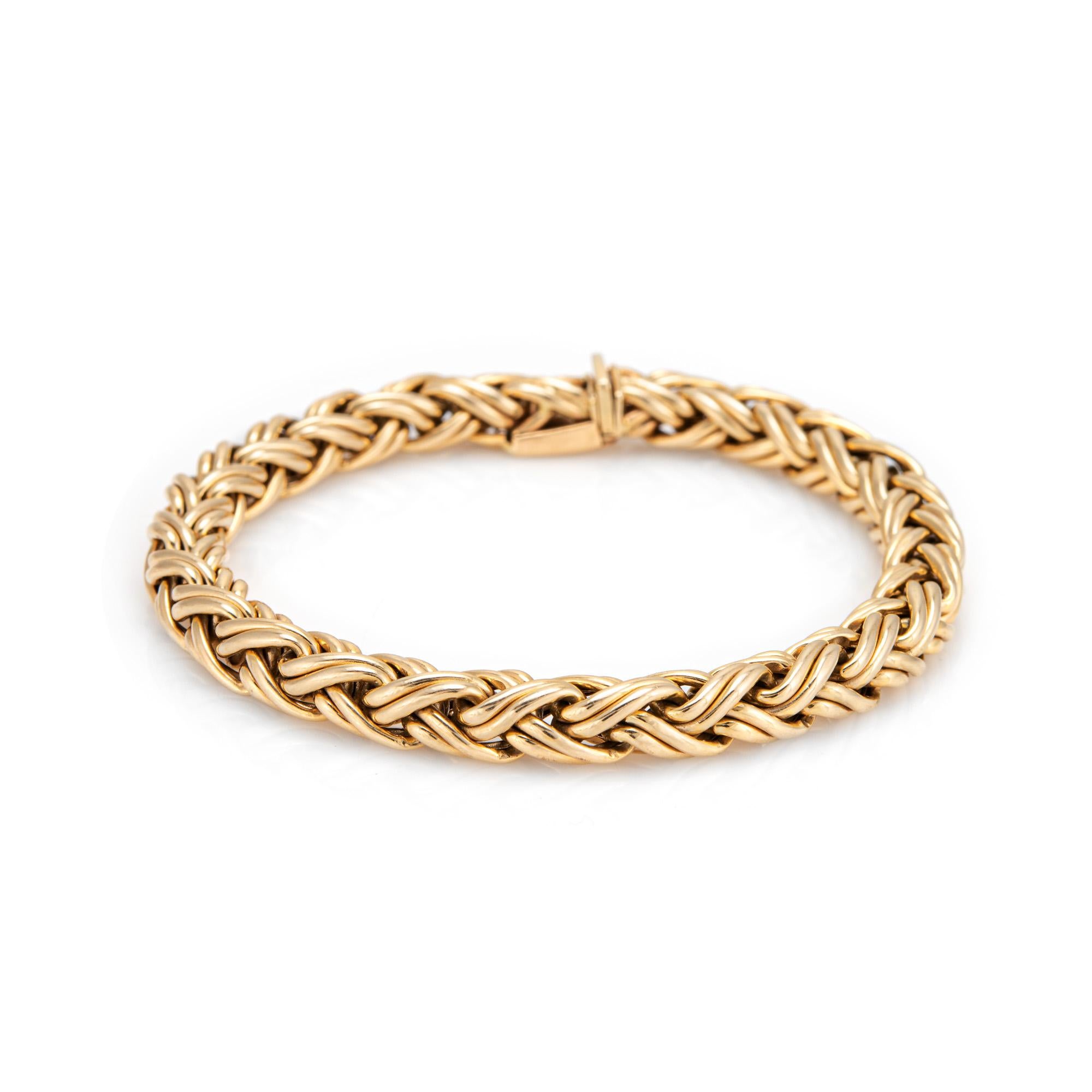Stylish and finely detailed pre-owned Tiffany & Co choker bracelet, crafted in 14k yellow.  

The bracelet features an interwoven fancy link weave pattern. Measuring 7 1/2 inches the bracelet is great worn alone or layered. The bracelet is a retired