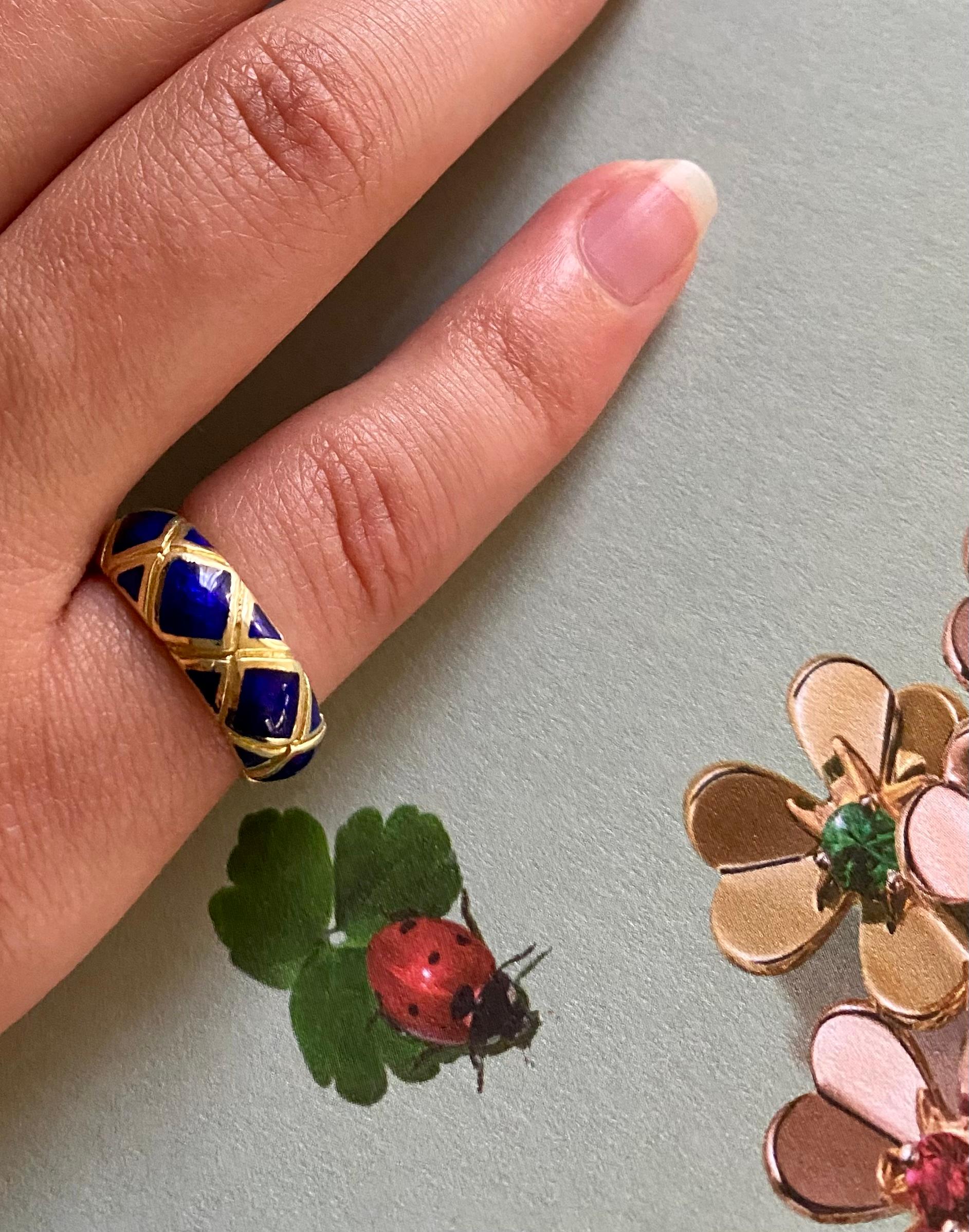Estate Tiffany & Co. 18K yellow gold and cobalt blue enamel band ring.
20th Century
The X design is one of Tiffany & Co. most iconic and recognizable motifs, signifying love. Jean Schlumberger and Paloma Picasso were among the most notable Tiffany &