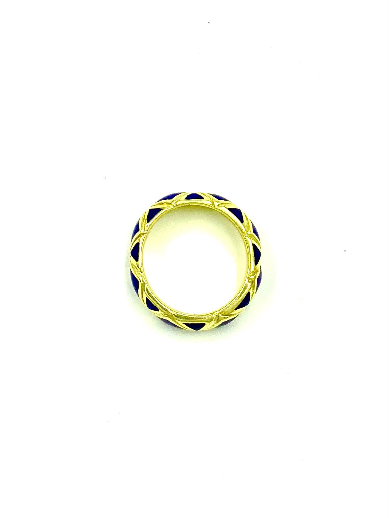 Estate Tiffany & Co. 18K yellow gold and cobalt blue enamel X pattern band ring.
Excellent condition
Marks: 18K, Tiffany on the interior of band
Size 5US
7mm wide