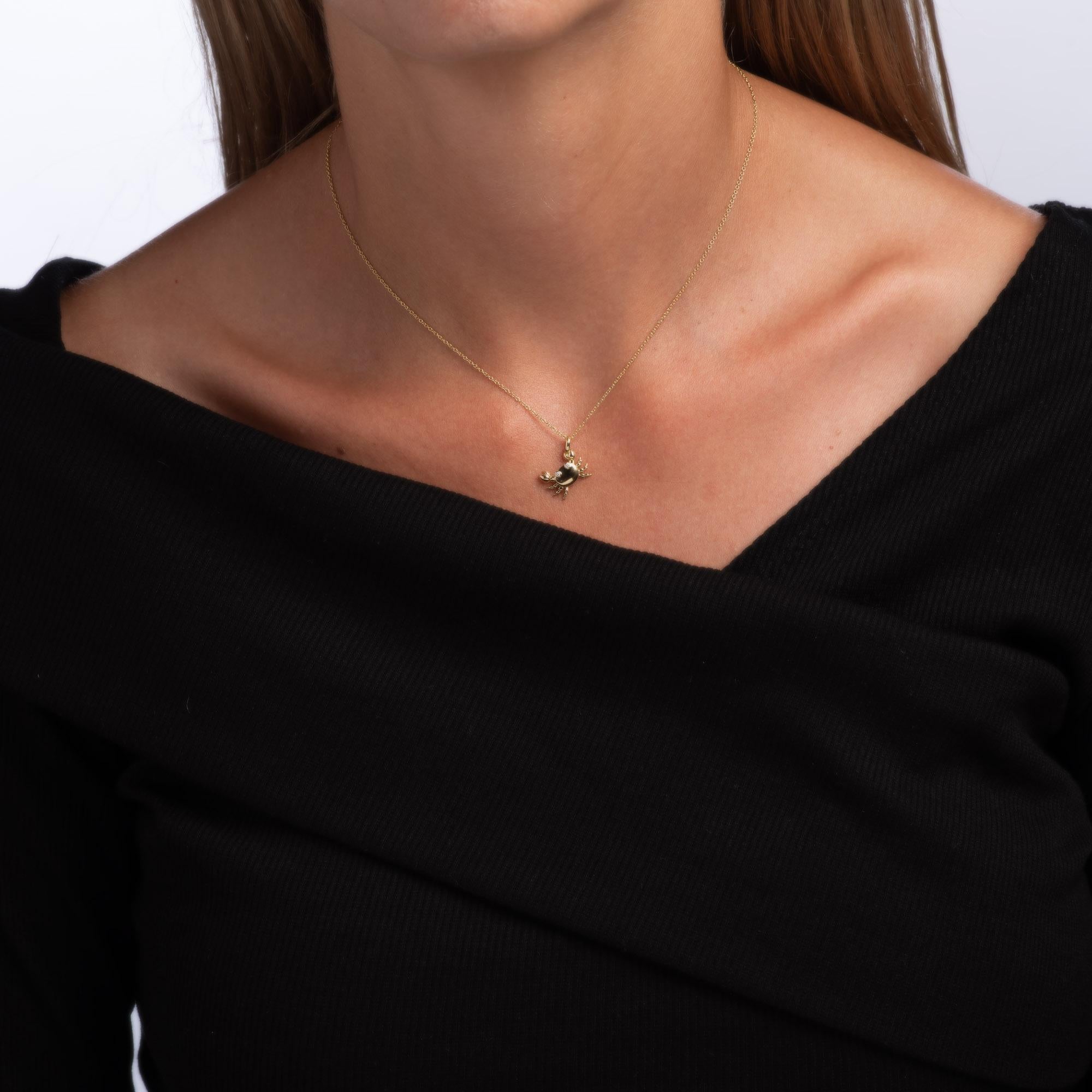 crab necklace meaning