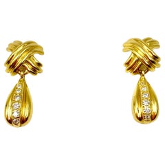 Estate Tiffany
Co. Diamond 18K Yellow Gold Signature X Drop Earrings