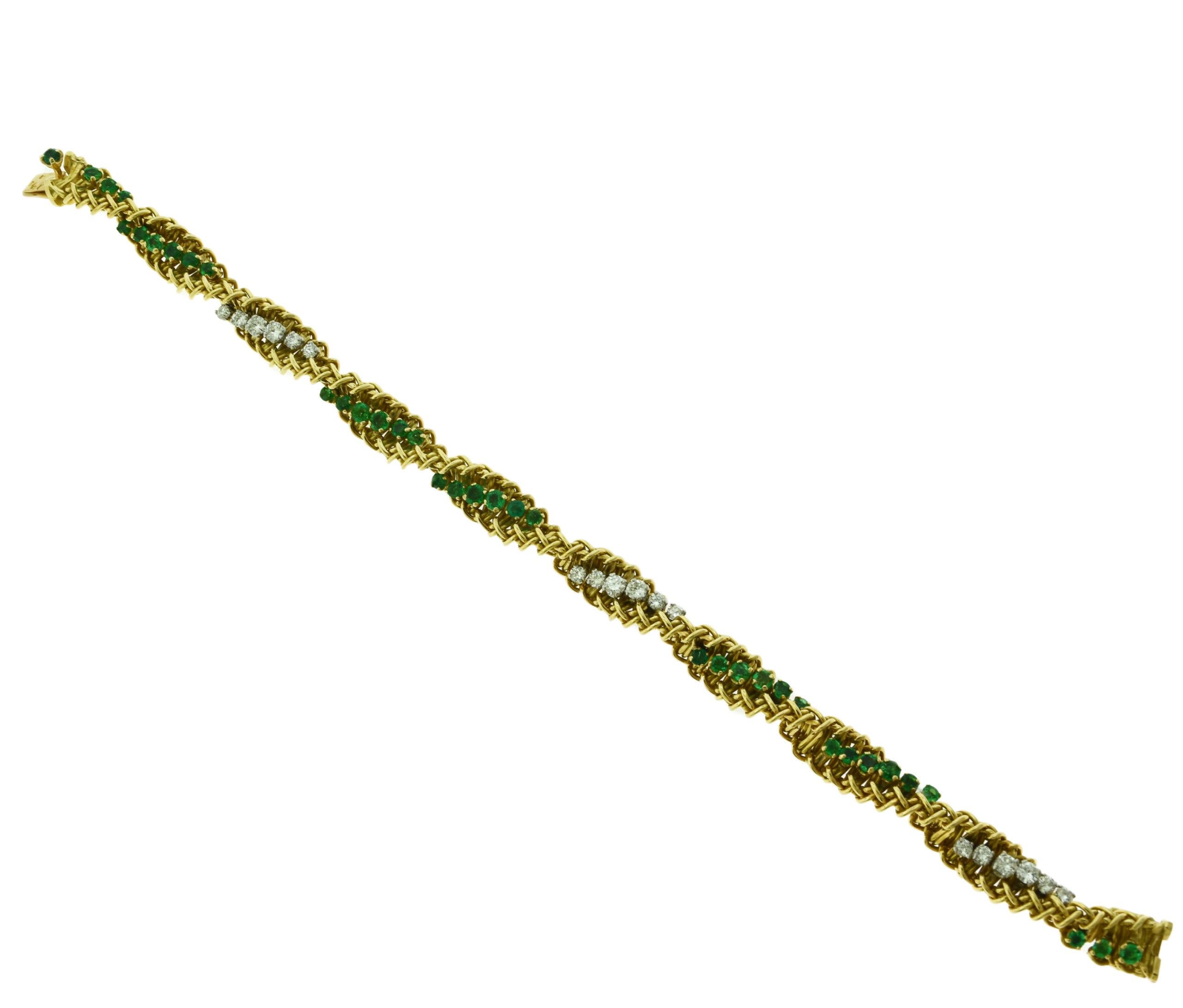 Estate Tiffany & Co. Emerald and Diamond Swirl 18 Karat Yellow Gold Bracelet In Good Condition In Miami, FL
