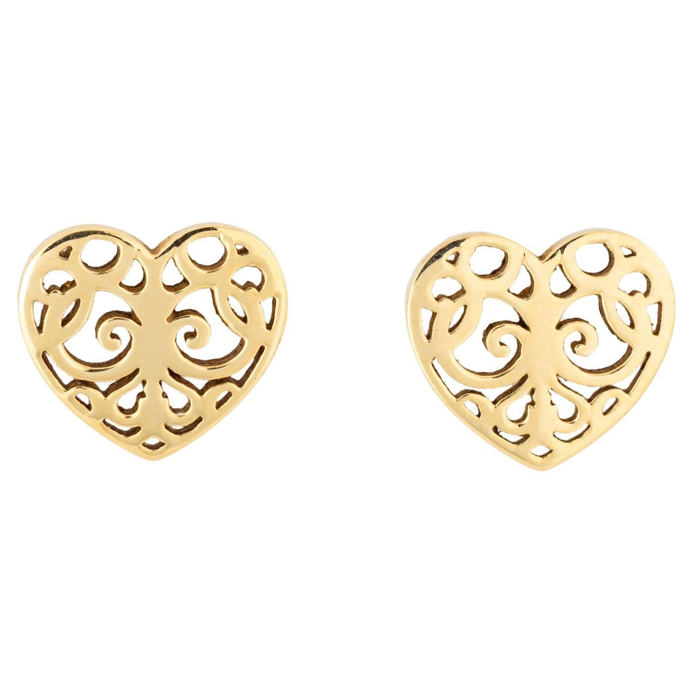Tiffany & Co. Clous d'oreilles en forme de cœur en or jaune 18 carats, ancienne propriété  en vente