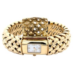 La succession de Tiffany & Co. Bracelet manchette de montre à cadran Hidden Or 18K