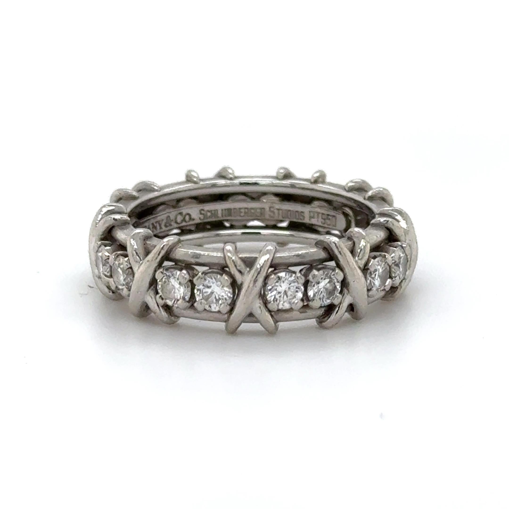 Estate Tiffany & Co. Jean Schlumberger Studios collection ring.
18 round brilliant diamonds, 1.14 carats. Approximately F color and VS1 clarity. Platinum, 11.1 grams, size 8.
Accommodated with an up-to-date digital appraisal by a GIA G.G. once