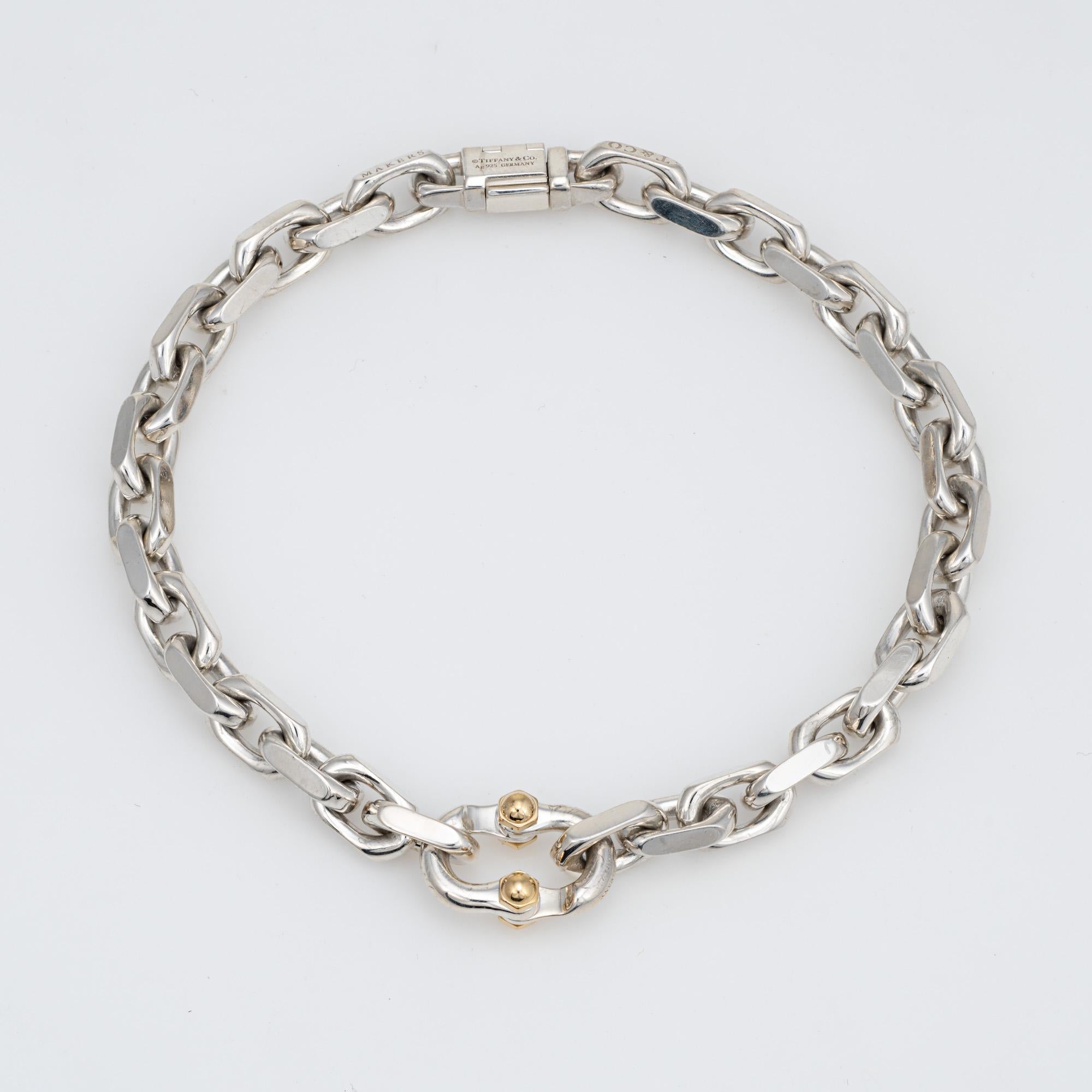 Stylish and finely detailed pre-owned Tiffany & Co Makers bracelet, crafted in sterling silver & 18 karat yellow gold.  

The bracelet features a utilitarian design with a Makers symbol inspired by the renowned Hollowware shop. Measuring 7 inches in