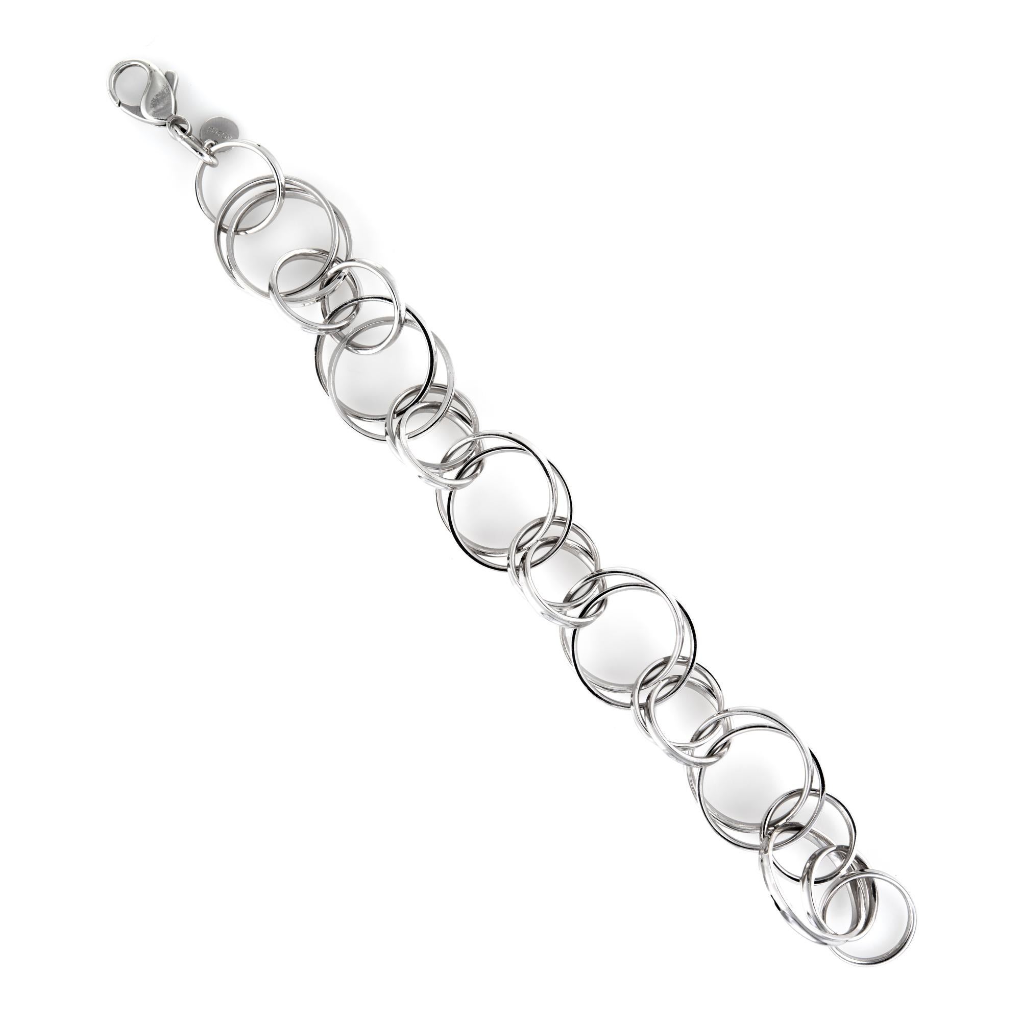 Elegant pre owned Tiffany & Co bracelet, crafted in 925 sterling silver. 

The bracelet is comprised of multiple rings of beveled circles that graduate in size from 20mm to 15mm.  

The bracelet is in excellent original condition and was recently