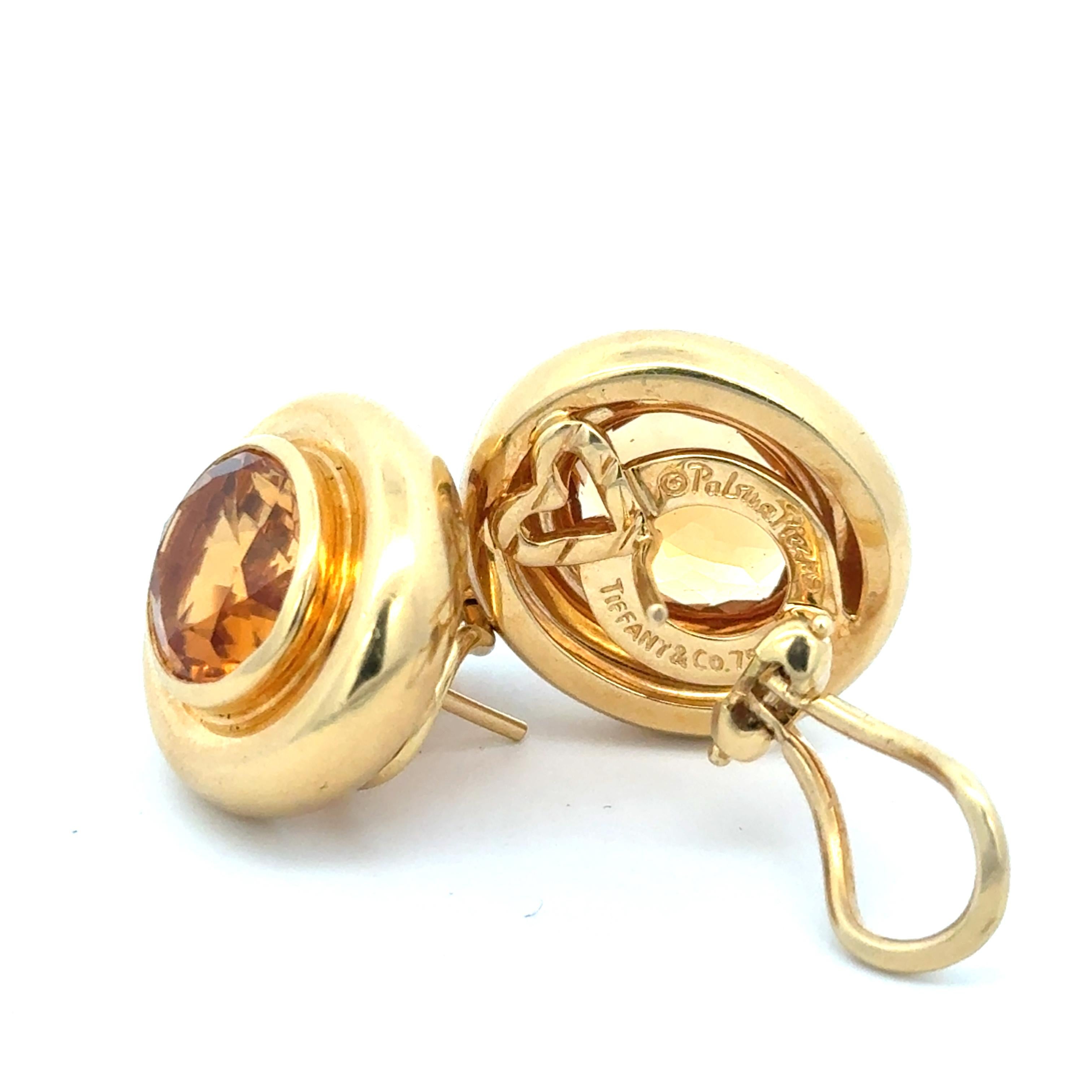 Estate Tiffany & Co. Oval Cut Citrine Earrings in 18K Yellow Gold. The earrings measure approximately 0.80