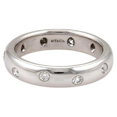Estate Tiffany
Co Platinum Band with Etoile Set Round Diamonds
