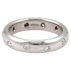 Estate Tiffany& Co Platinum Band with Etoile Set Round Diamonds