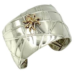 Estate Tiffany & Co. Bracciale Spider in argento sterling e oro giallo 18 carati