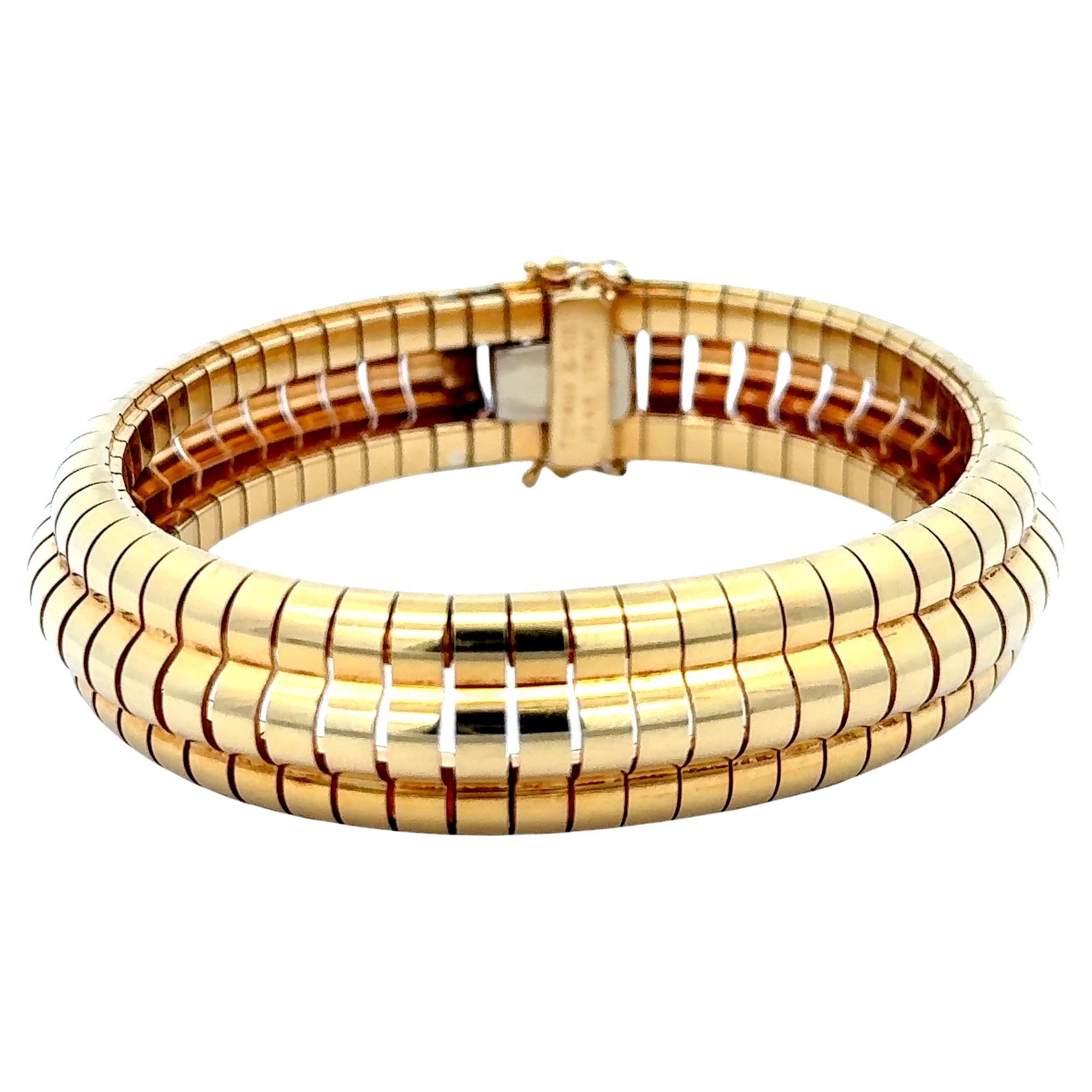 Estate Tiffany & Co. Bracciale flessibile a tre file in oro giallo 18 carati