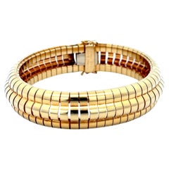 La succession de Tiffany & Co. Bracelet souple à trois rangs en or jaune 18 carats