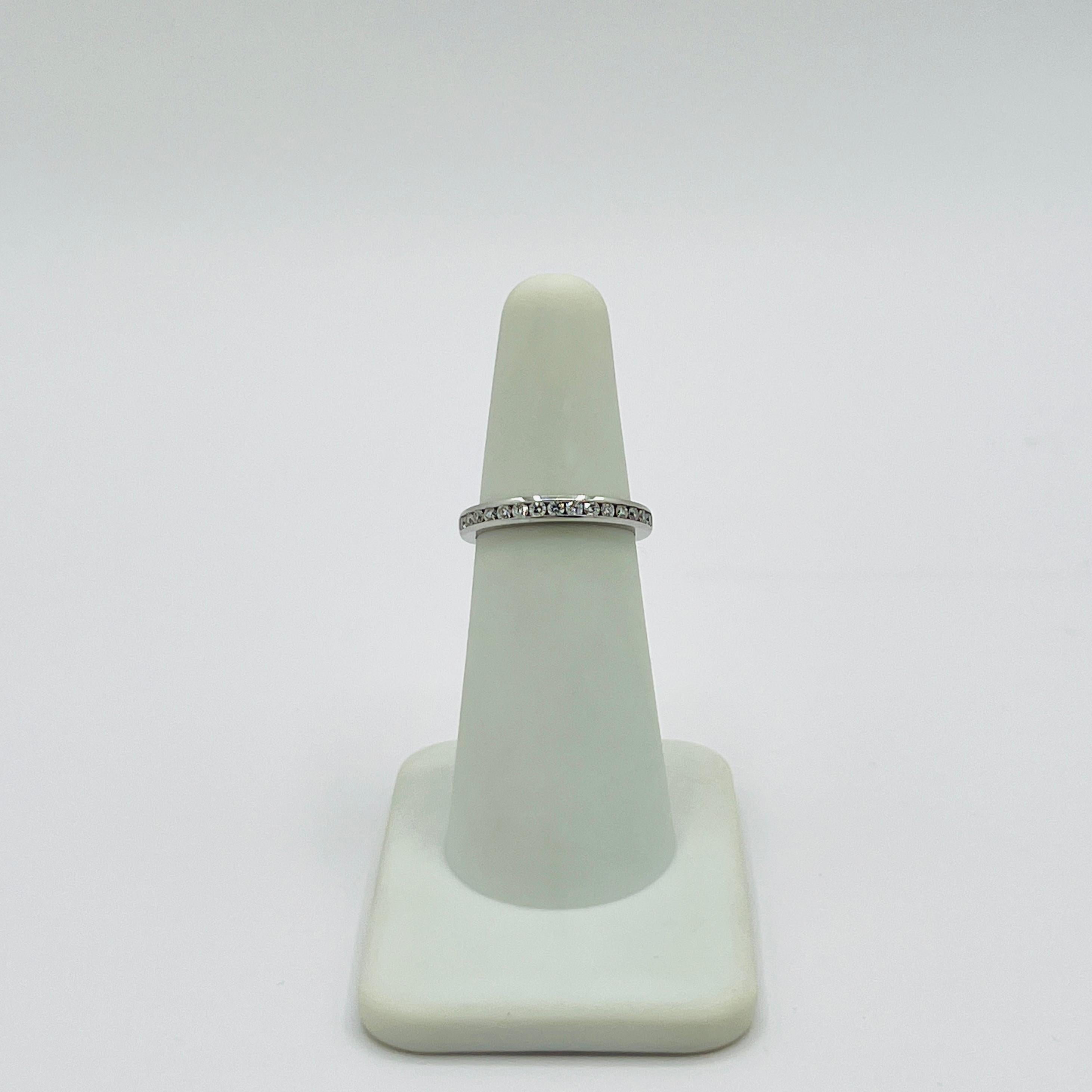 Women's or Men's Estate Tiffany & Co White Diamond Round Ring in Platinum For Sale