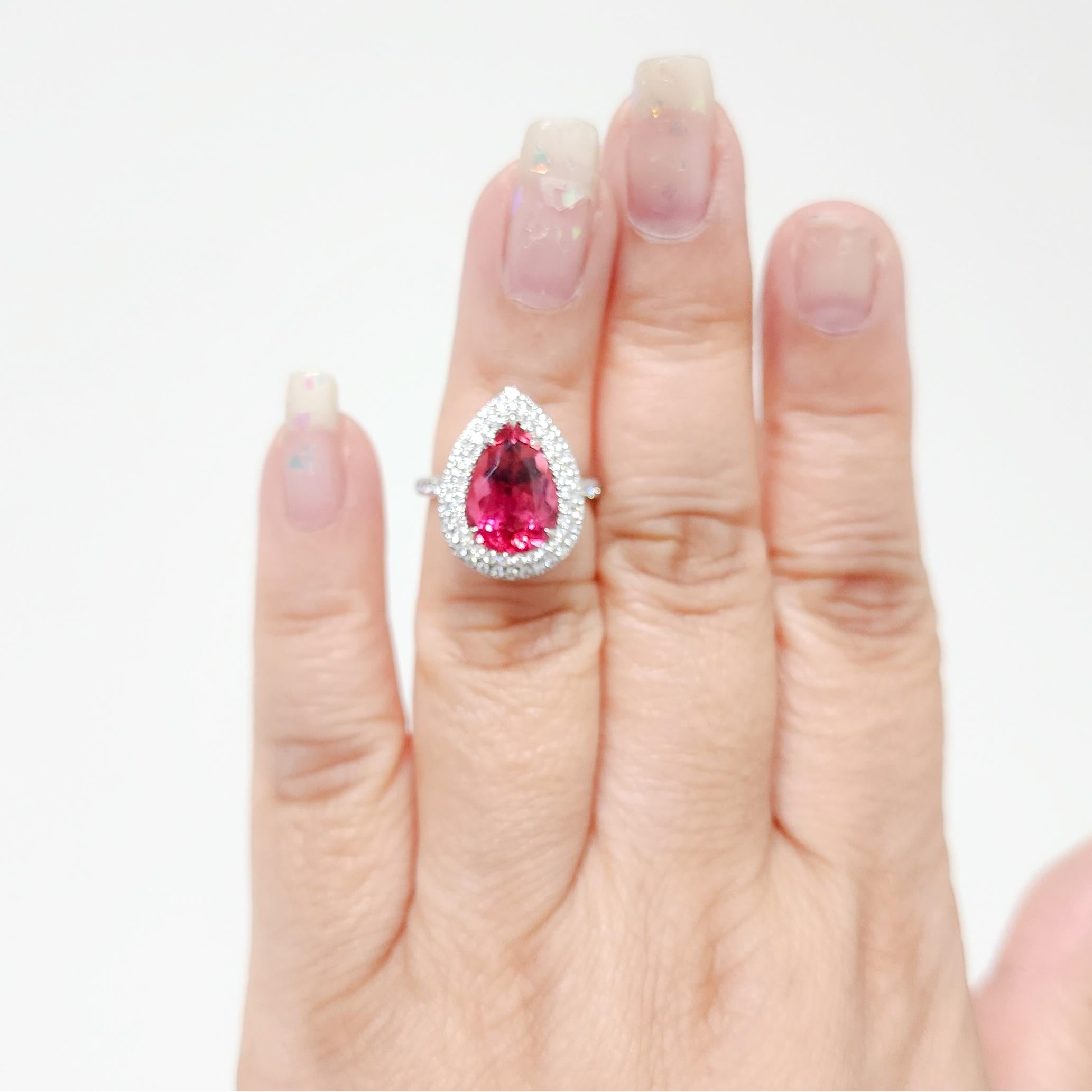 Gorgeous Tiffany & Company Soleste 4.70 ct. rubellite pear shape with 0.60 ct. good quality, white, and bright diamond rounds.  Handmade in platinum.  Ring size 6.