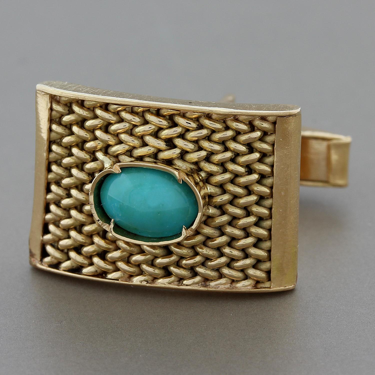 This pair of estate cufflinks feature an oval cut turquoise in a bezel setting in the center of the 14K yellow gold setting. The convex setting details intricate handwork of weaved gold.