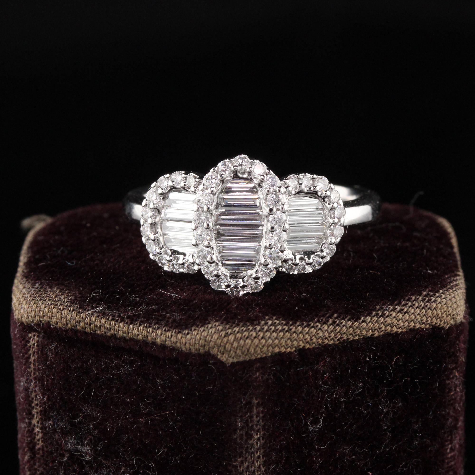 A gorgeous Estate Vintage 14K White Gold Diamond Baguette Cluster 3 Stone Ring. This beauty was made in the 1990s and has a gorgeous and big looks. All the baguette stones were individually cut for this ring. A really beautiful look!

#R0603

Metal:
