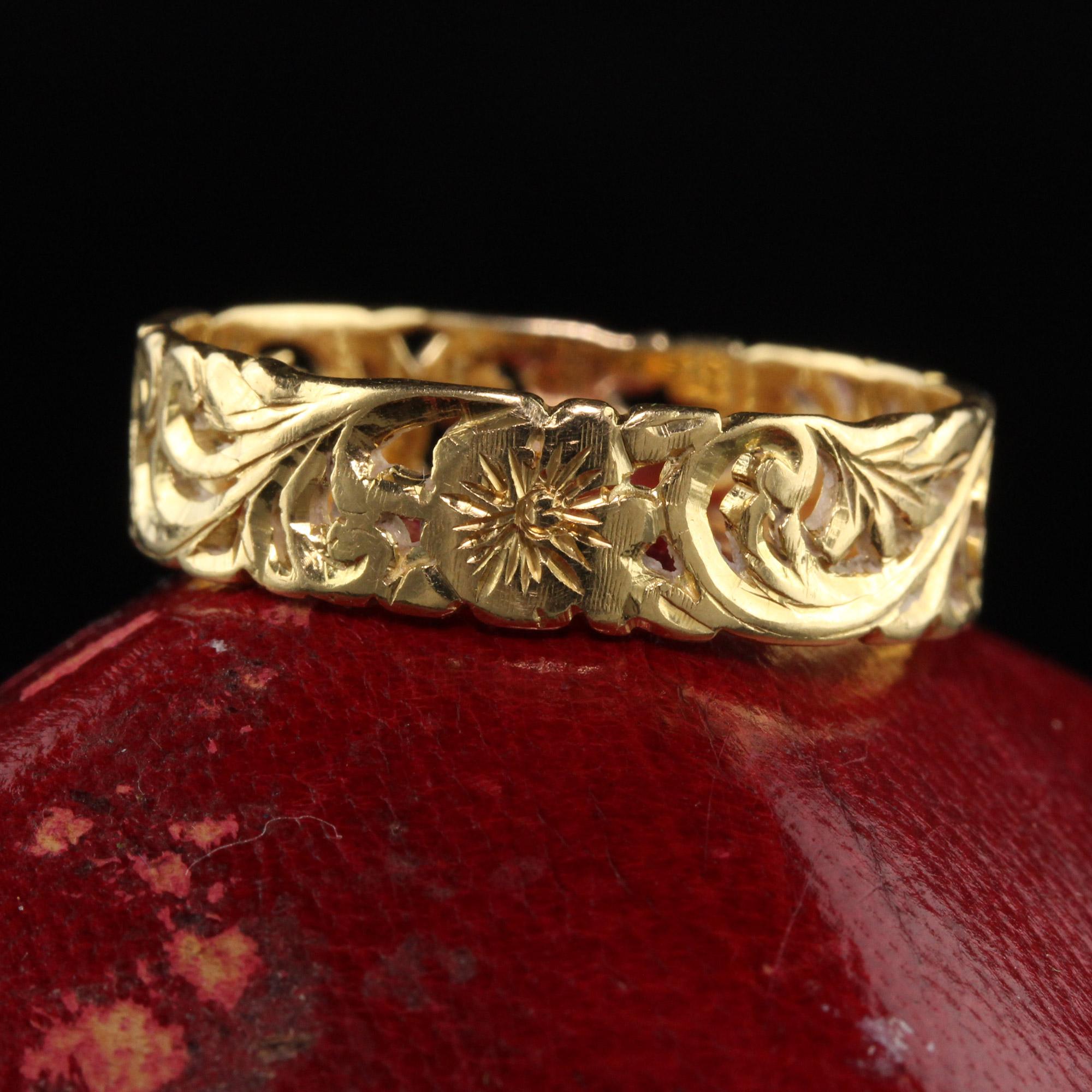Beautiful Estate Vintage 18K Yellow Gold Floral Engraved Wedding Band. This beautiful band has open gold work one it as well as gorgeous floral engravings going around the entire ring.

Item #R1020

Metal: 18K Yellow Gold

Weight: 4.9 Grams

Ring