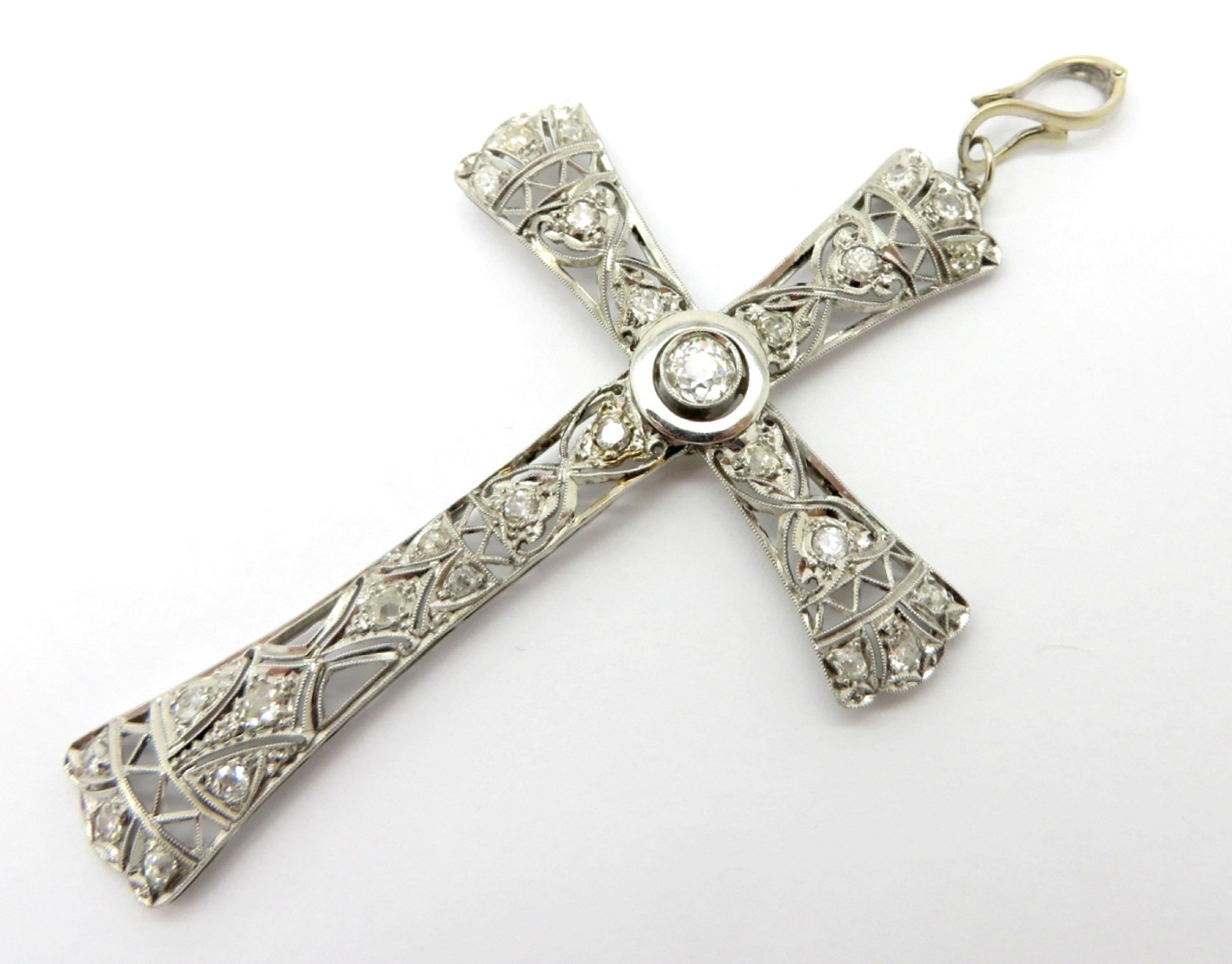 For sale is a beautiful large Art Deco Platinum Diamond Cross pendant!
Showcasing one (1) Old European Cut diamond in the center, measuring 4.67 – 4.79 x 3.26 mm, weighing approximately 0.45 carats. Diamond Grading: Color Grade: I. Clarity Grade: