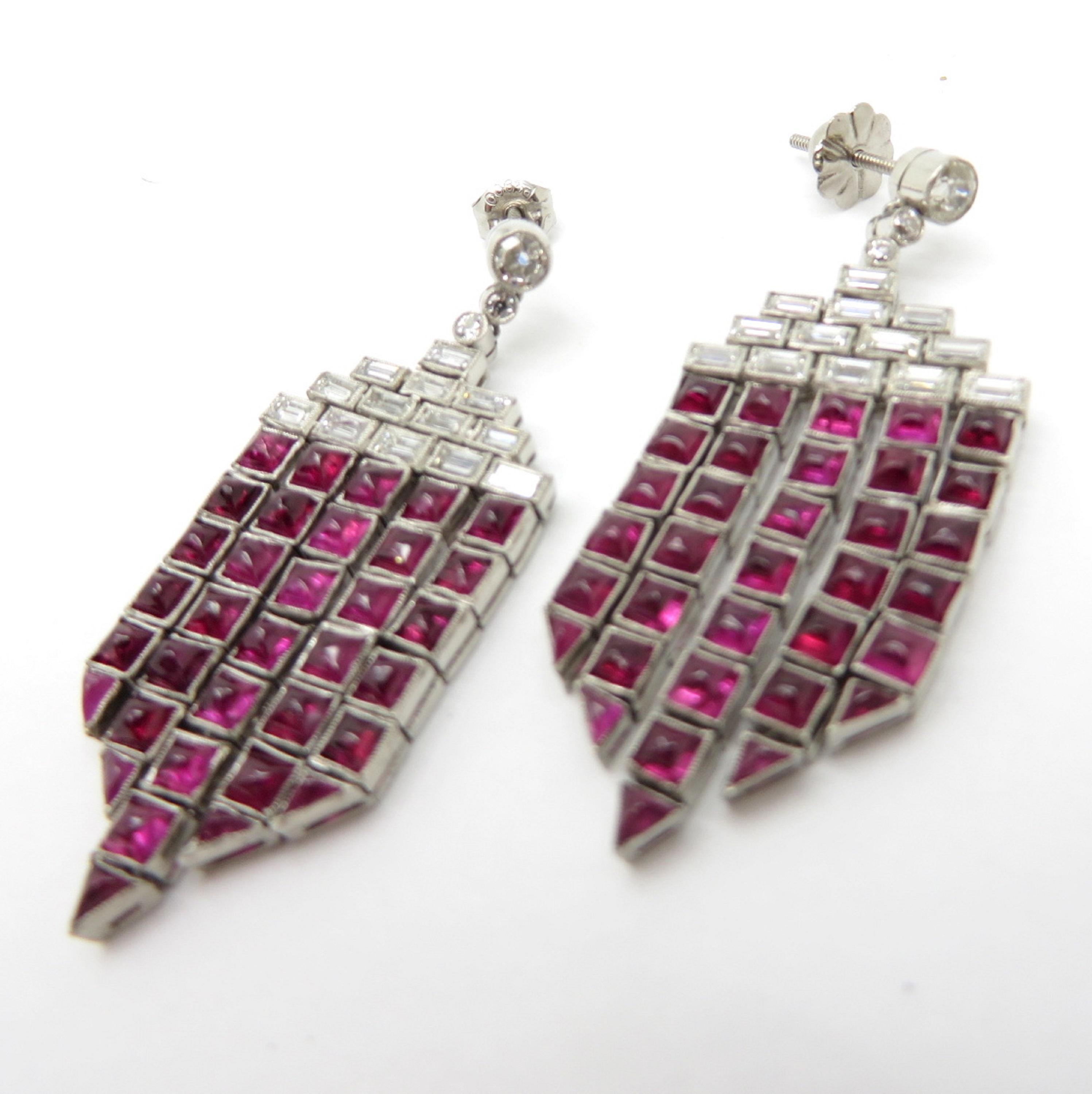 For sale is a stunning pair of Art Deco Platinum Earrings with Rubies and Diamonds!
Showcasing six (6) Old European Cut diamonds, with various measurements, having I-K Color Grade and SI1-SI2 Clarity Grade and twenty-six (26) Straight Baguette