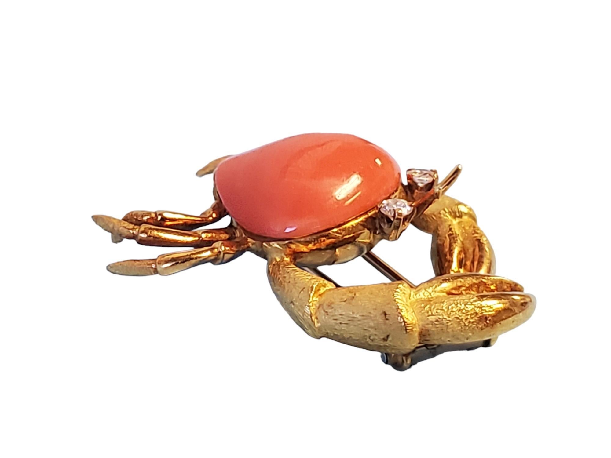 Listed is an estate vintage crab pin/brooch. It is beautifully made with angel skin coral and 2 white vs diamonds approximately .15tcw.  The pin was added in 14k white gold. the body is 18k yellow gold. This pin was created circa 1940-1950's. The