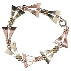 Succession Vintage Tiffany 
Co. Bracelet en or rose et jaune 14K - VHK#998a