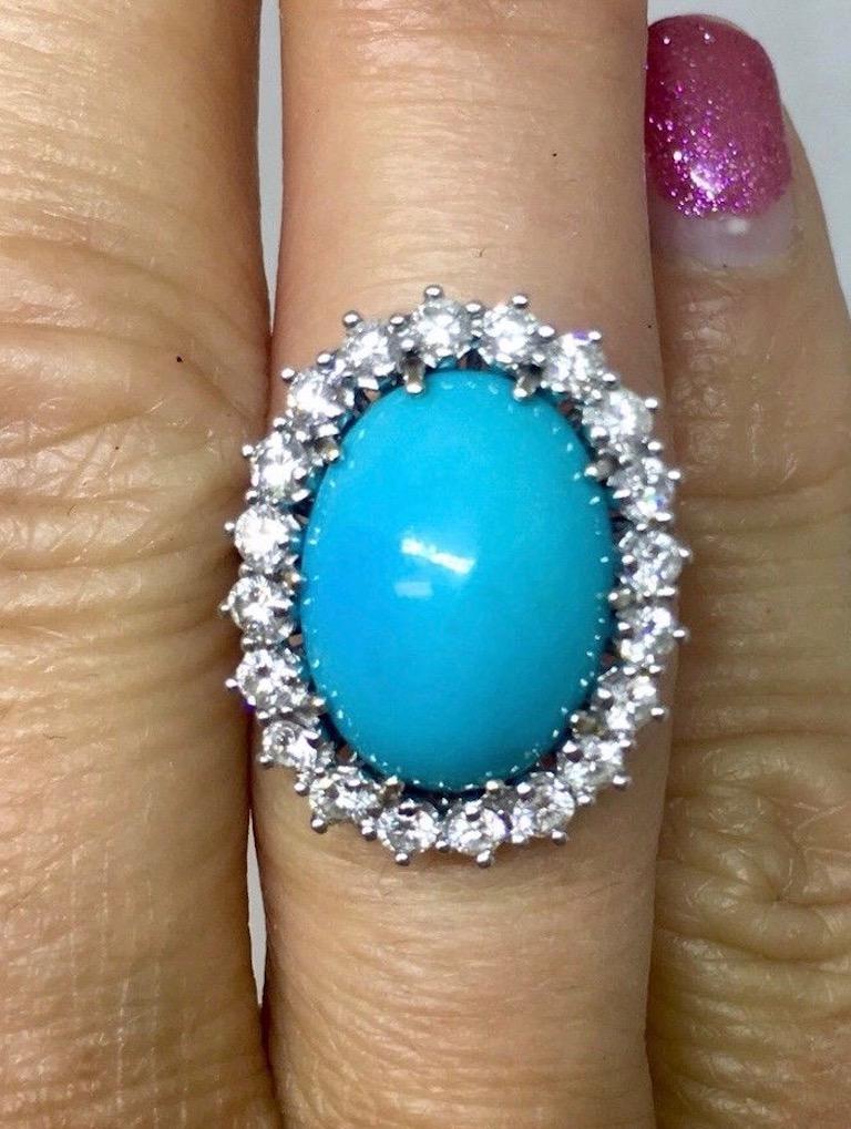 Stunning 18K Gold Turquoise Cabochon 1.00 ct VS Diamond Cocktail Ring

This gorgeous cocktail ring features a gorgeous 8.73 carat beautiful blue turquoise cabochon. A chic, colorful, sparkly and elegantly styled ring!

The ring also features a halo