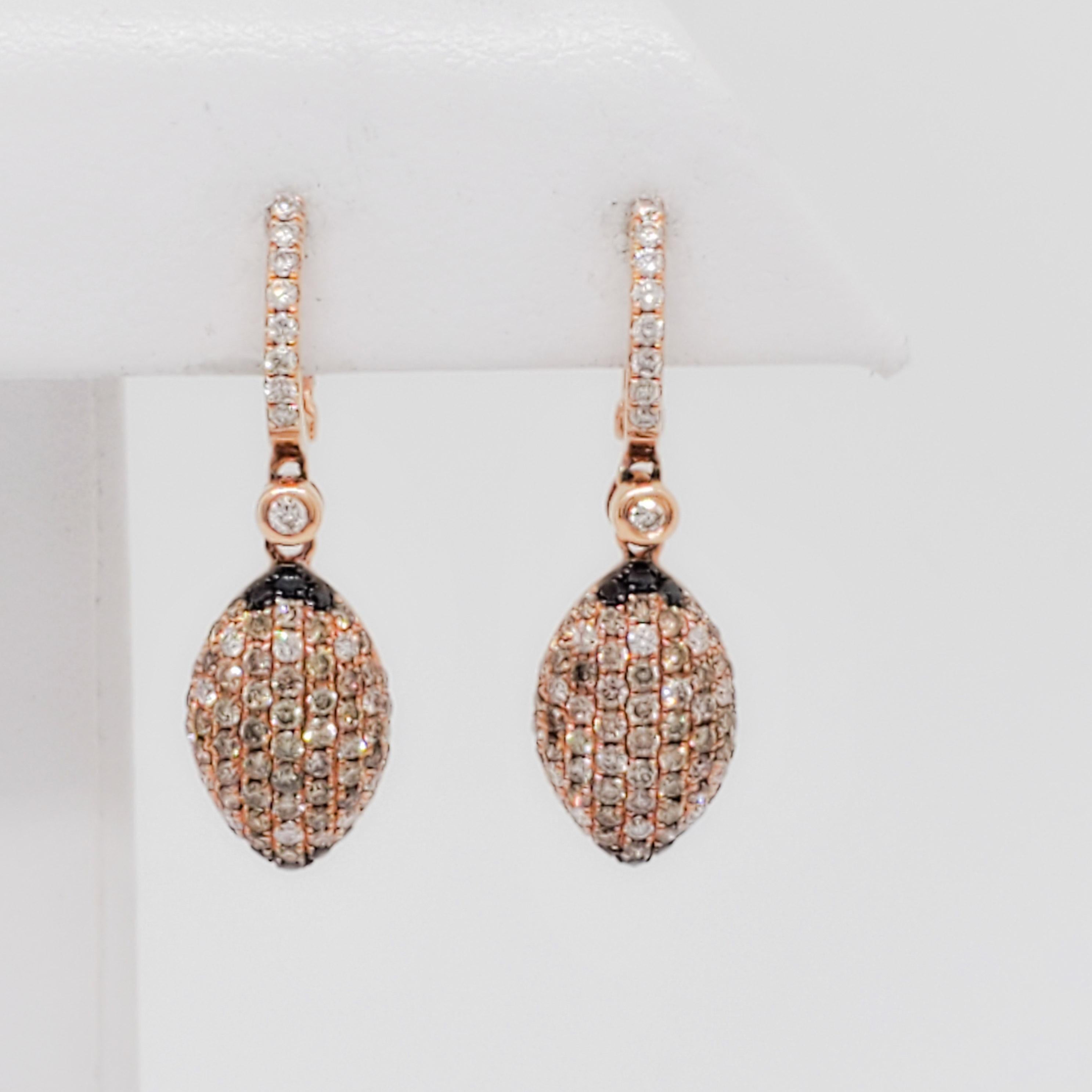 Gorgeous drop earrings with 1.53 ct. of white and black diamond rounds.  Handmade 14k rose gold mountings.