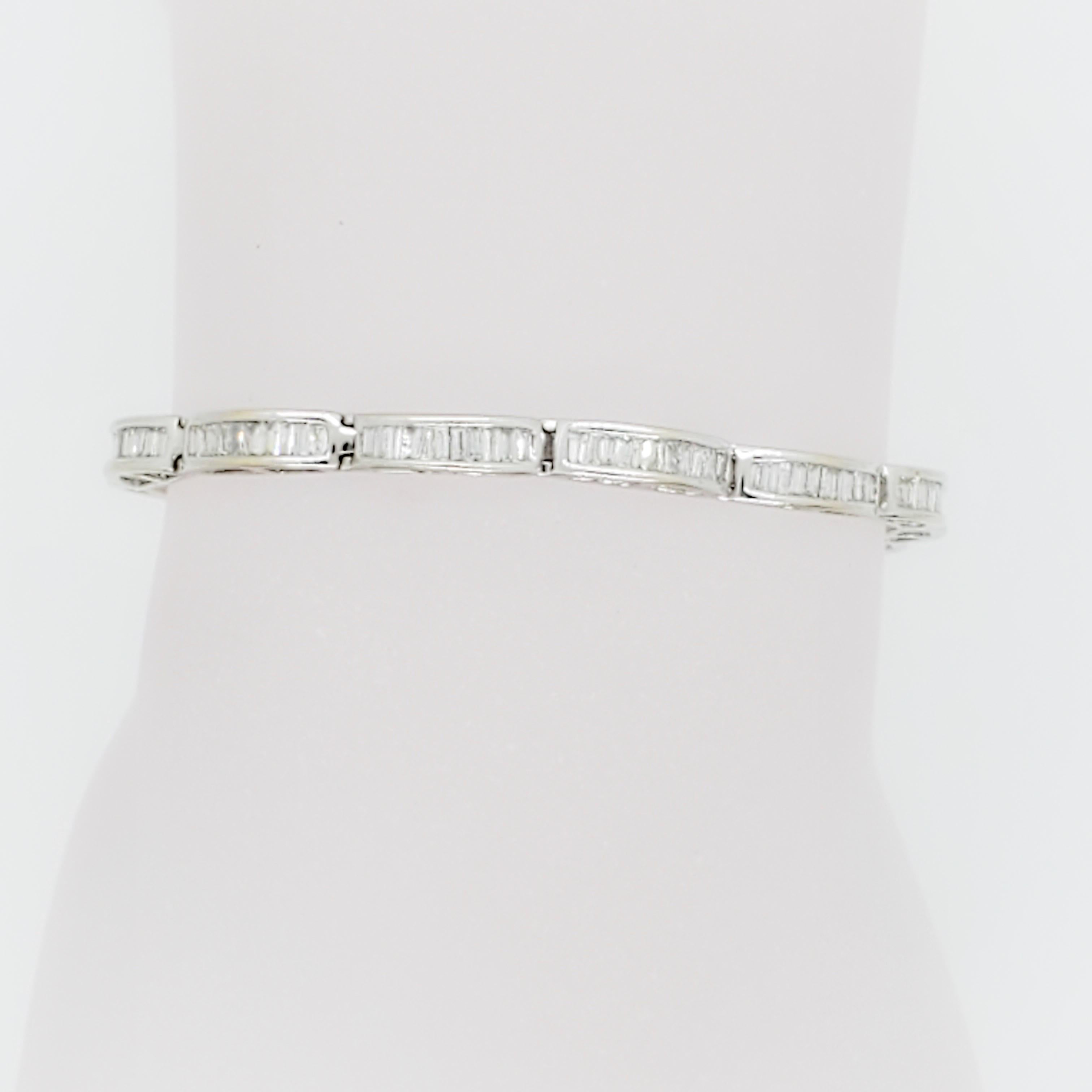 Beautiful estate bracelet with 3.25 ct. of good quality, white, and bright diamond baguettes.  Handmade 14k white gold mounting.  Length 7