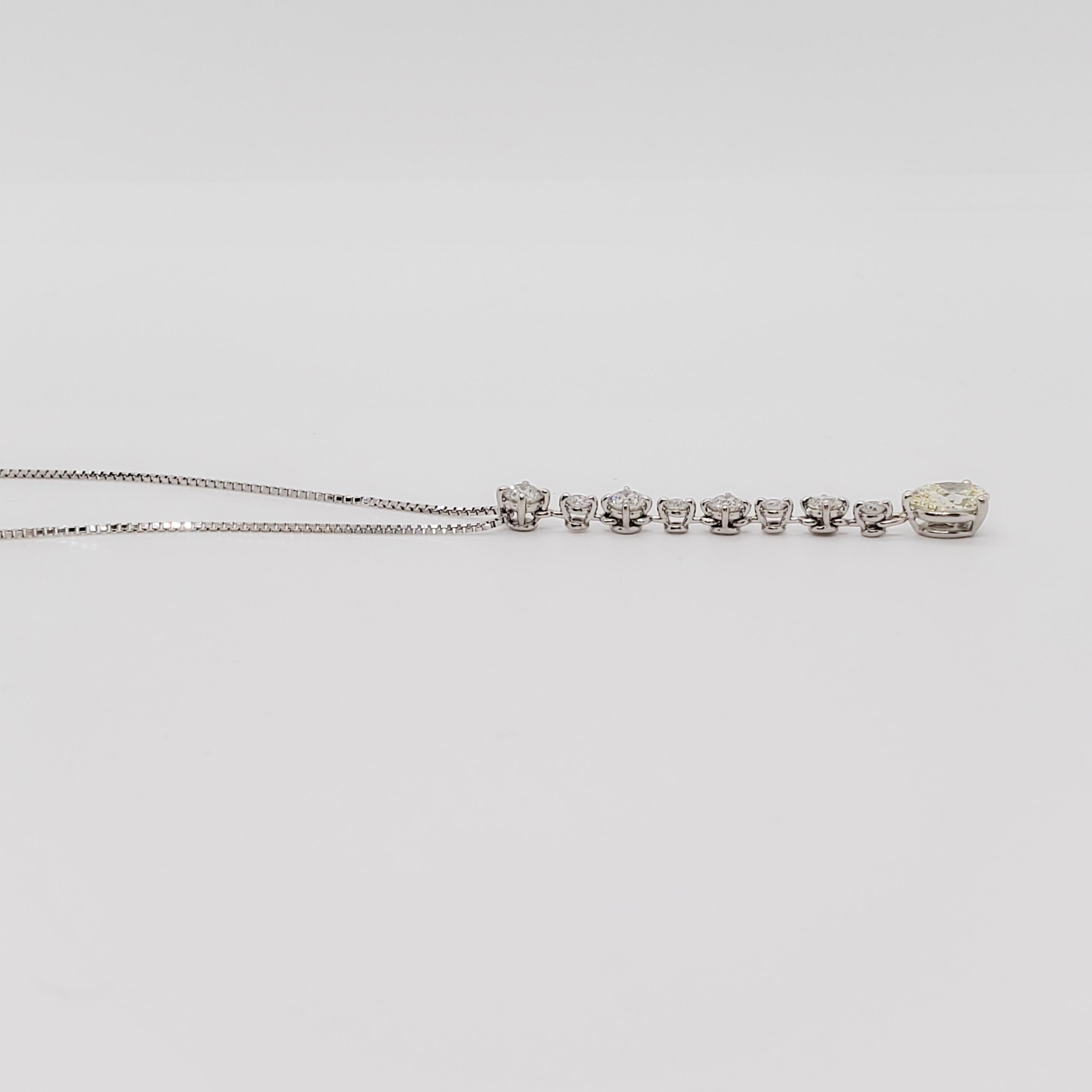 Oval Cut Estate White Diamond Oval Pendant Necklace in Platinum