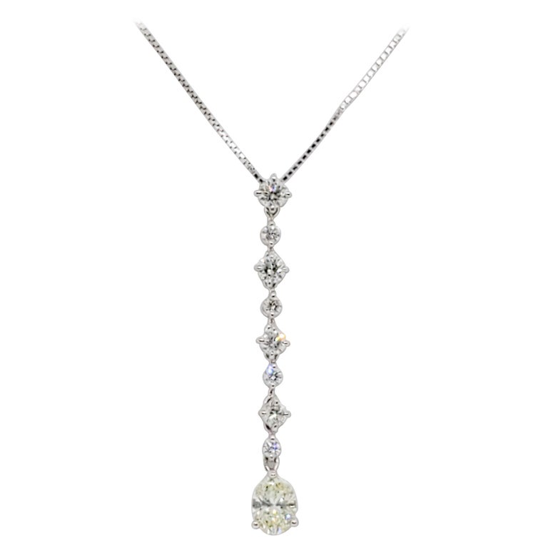 Estate White Diamond Oval Pendant Necklace in Platinum For Sale at 1stDibs