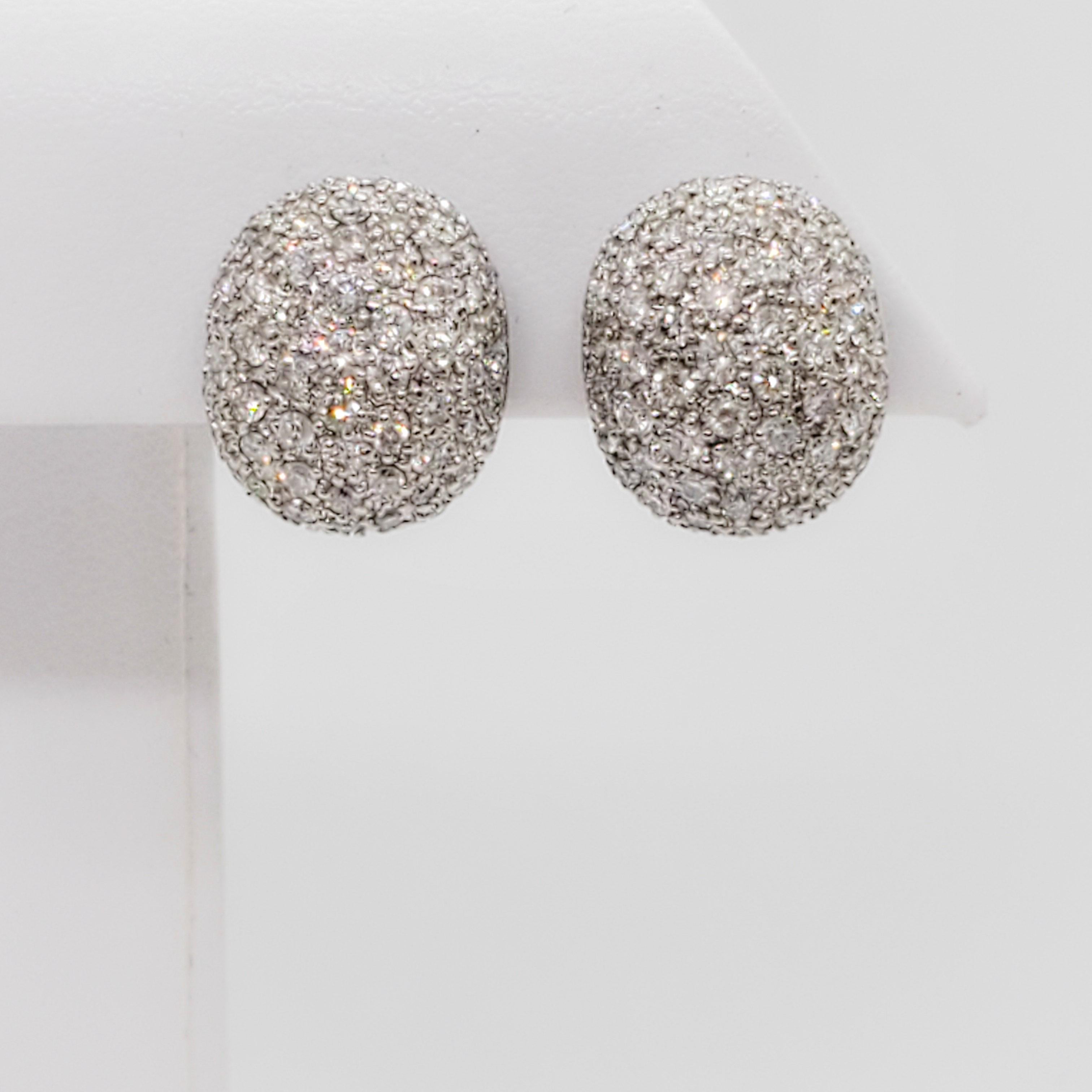 Beautiful white diamond pave earrings with 1.95 ct. of good quality, white, and bright diamond rounds. Handmade 18k white gold mountings.