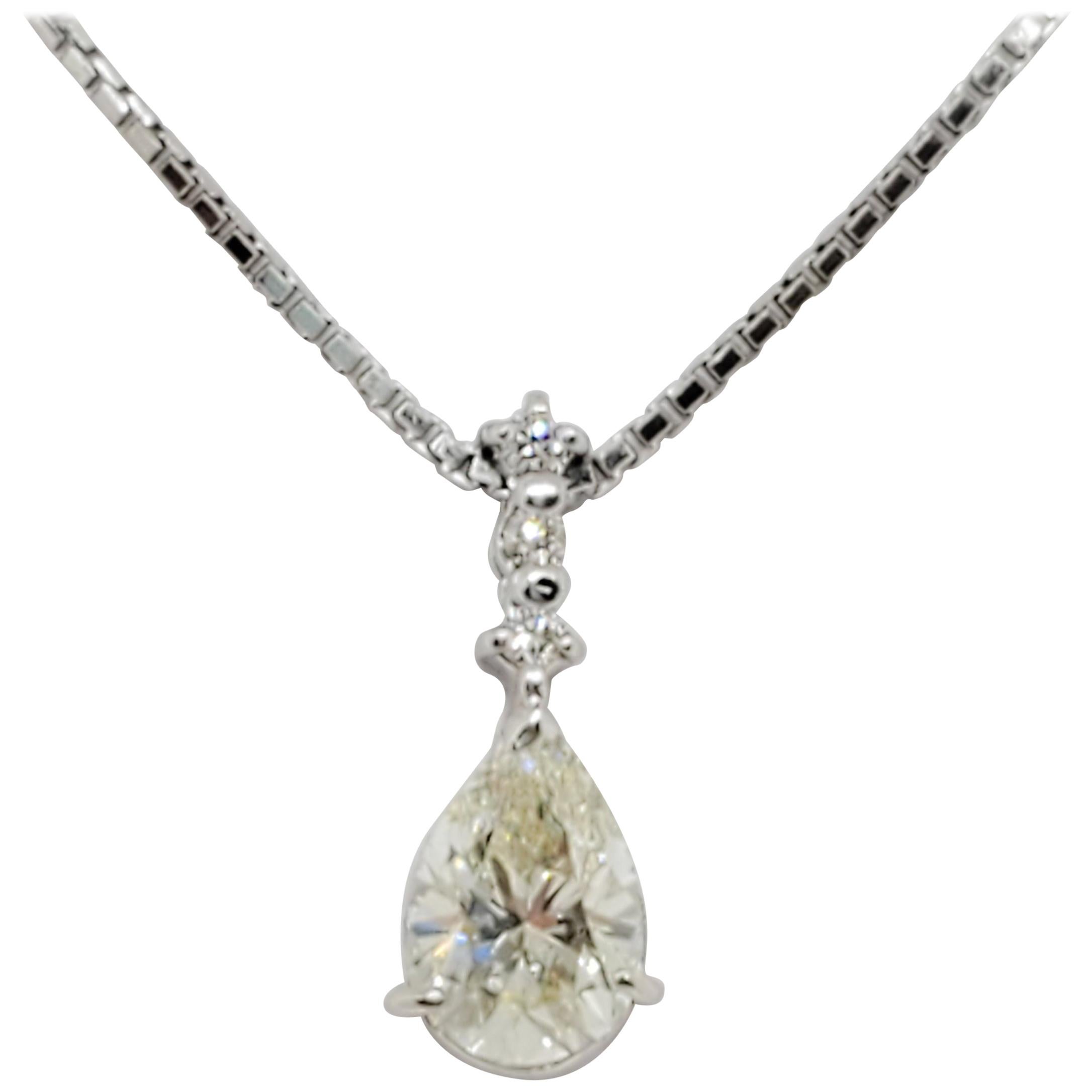 Estate White Diamond Pear Shape Pendant Necklace in Platinum