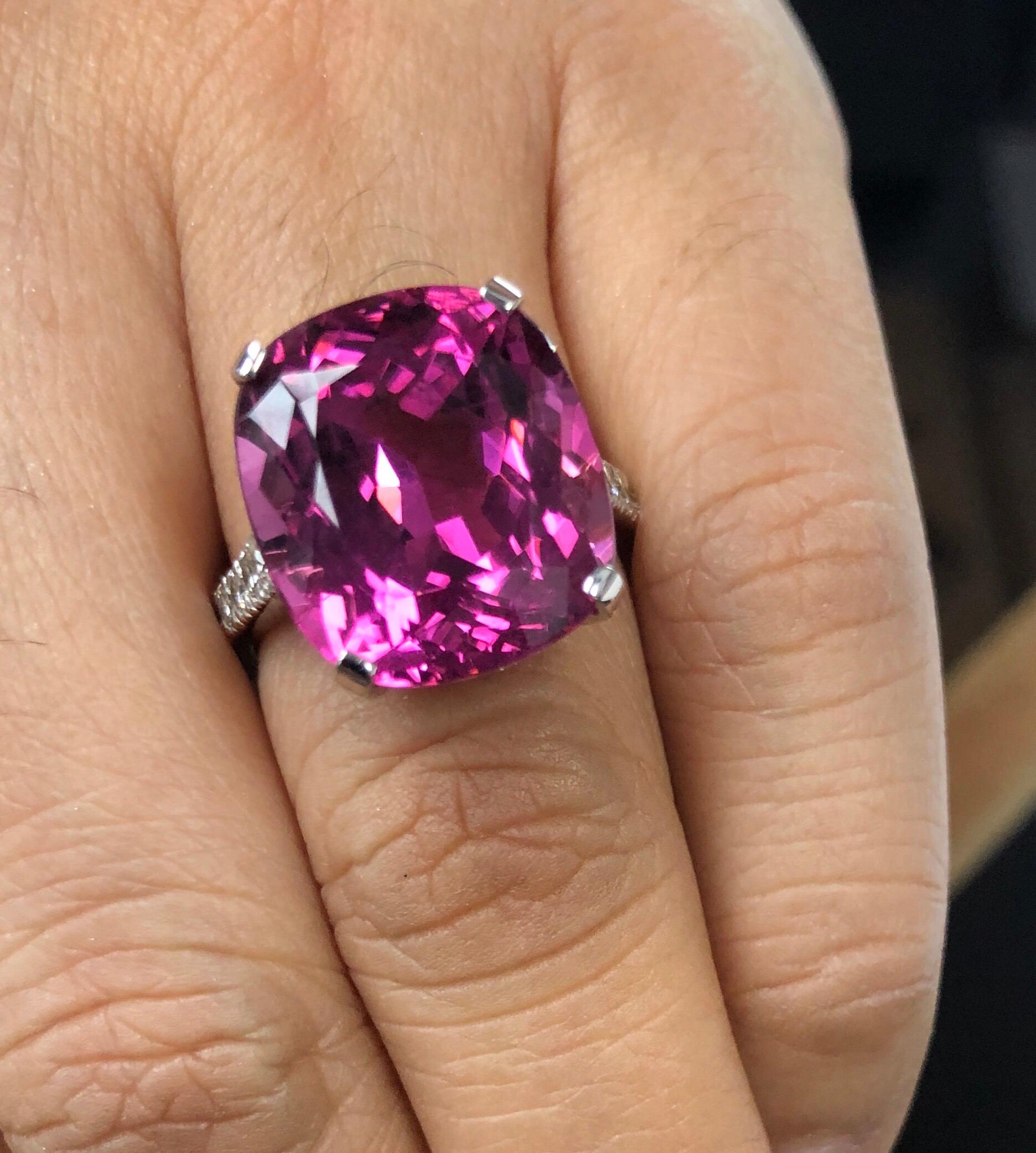 The estate 13.07 carat Pink Tourmaline-Rubellite Cushion Mixed Cut cocktail ring glows with brilliance from every angle, absolutely breathtaking, it is the centerpiece of an 18K white gold mount set to the shoulders and gallery with full cut