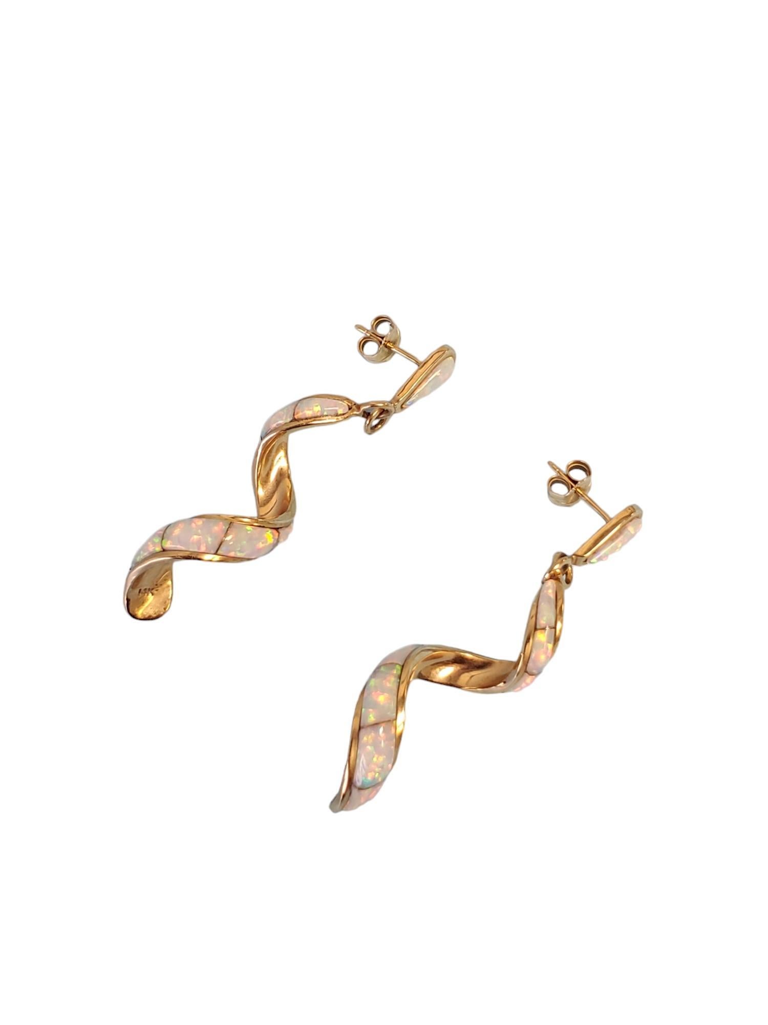 Listed are two fabulous 14k yellow gold white opal inlay spiral drop earrings. They are approximately 1.7
