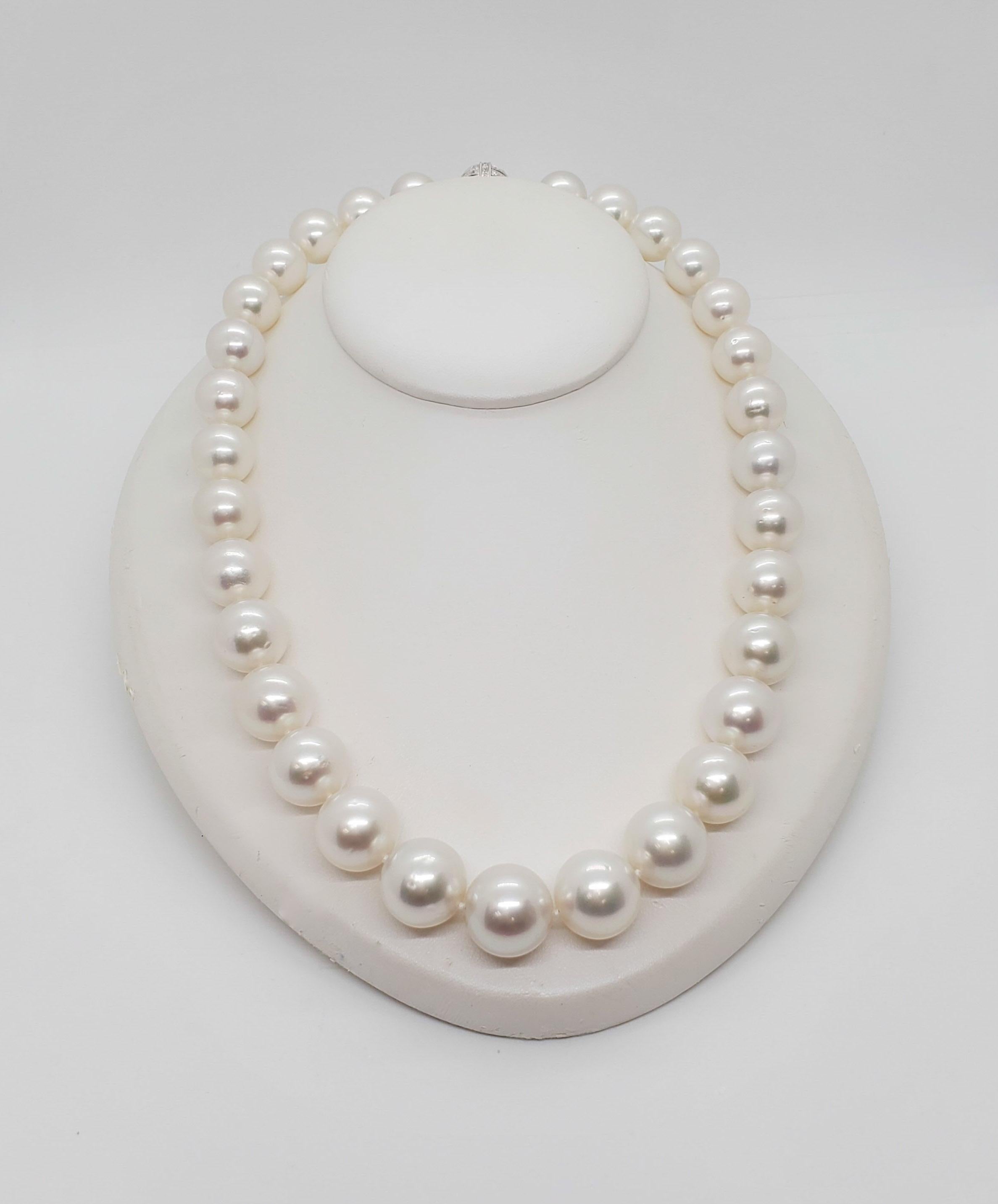 Gorgeous estate white South Sea pearls 12.3 to 16.10 mm in size. 18k white gold clasp with 0.24 ct. of white diamond rounds. Length is 18