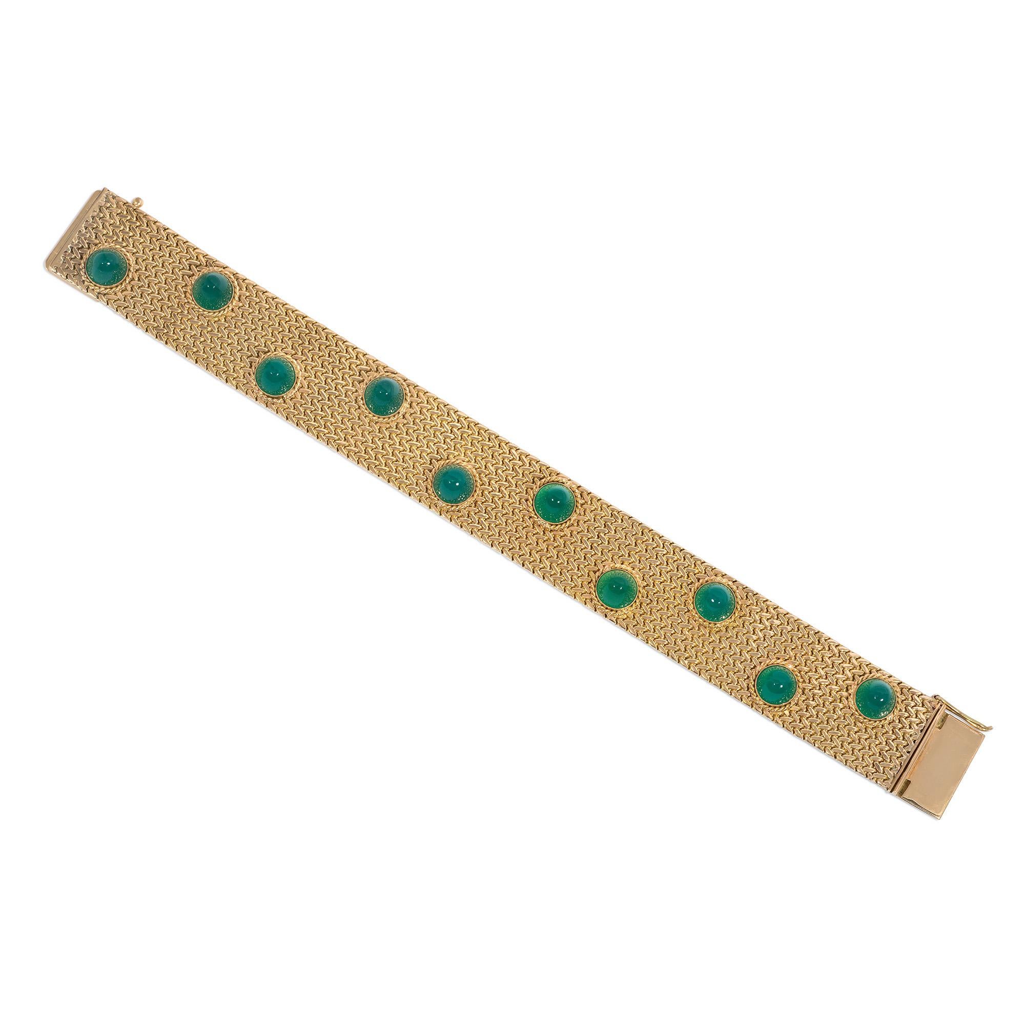 An estate gold and chrysoprase strap bracelet featuring a woven gold herringbone pattern studded with cabochon chrysoprase in ropetwist surrounds, completed by a tongue clasp with figure-8 safety mechanism, in 18k.

* Includes Kentshire's letter of