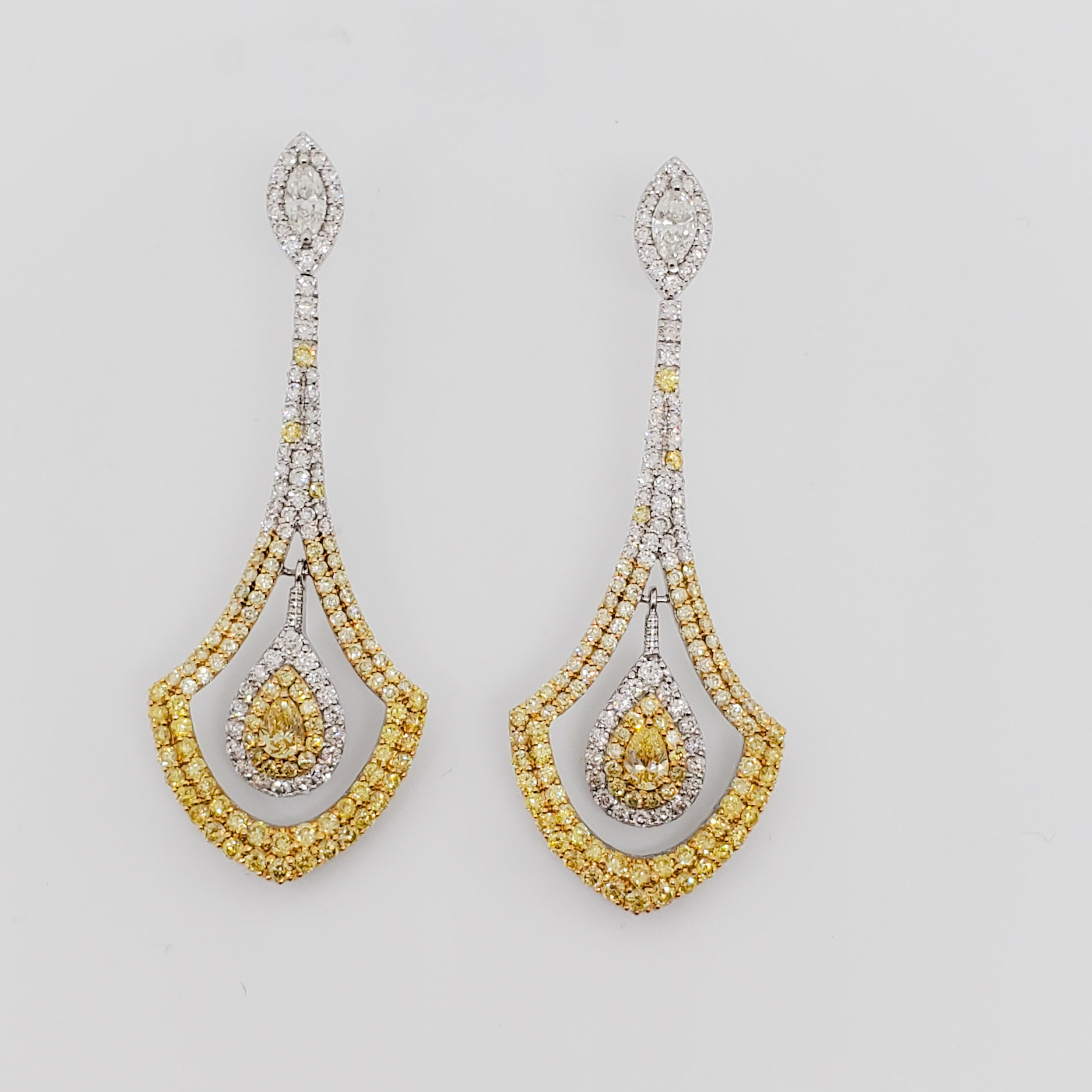 Gorgeous earrings with 2.64 ct. good quality white and yellow diamond marquise, ovals, and rounds.  Handmade in 18k white gold.  These are bright and beautifully made.