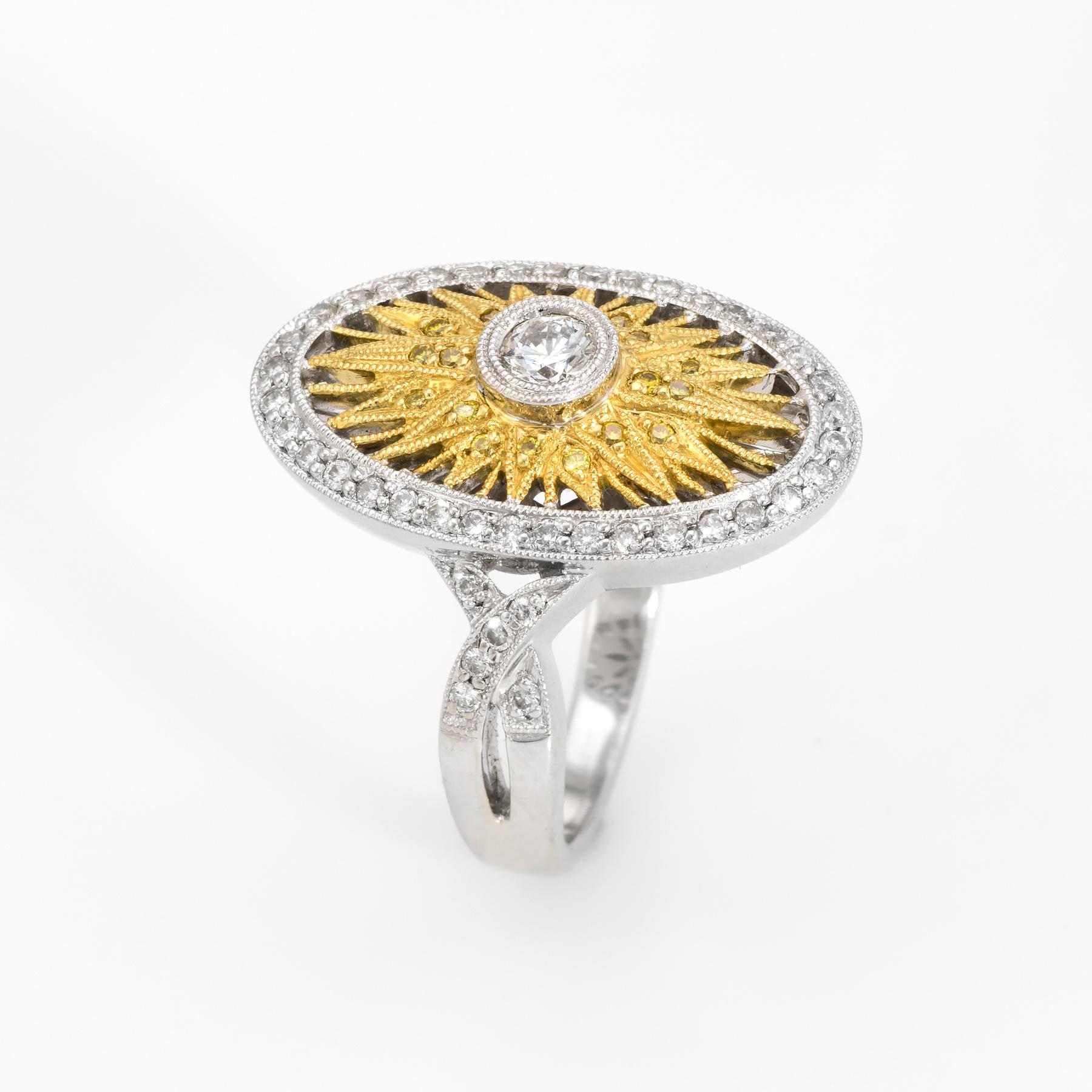 Finely detailed estate yellow & white diamond cocktail ring, crafted in 18 karat yellow & white gold. 

The center diamond is estimated at 0.15 carats, accented with an estimated 0.50 carats of yellow and white diamonds. The total diamond weight is