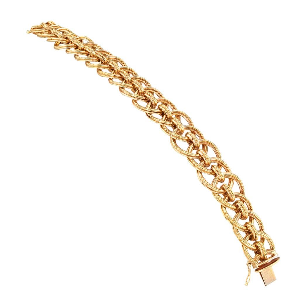 Estate yellow gold link bracelet by Garrard & Co, London circa 1970.  Love it because it caught your eye, and we are here to connect you with beautiful and affordable jewelry.  It is time to claim a special reward for Yourself!  Simple and concise