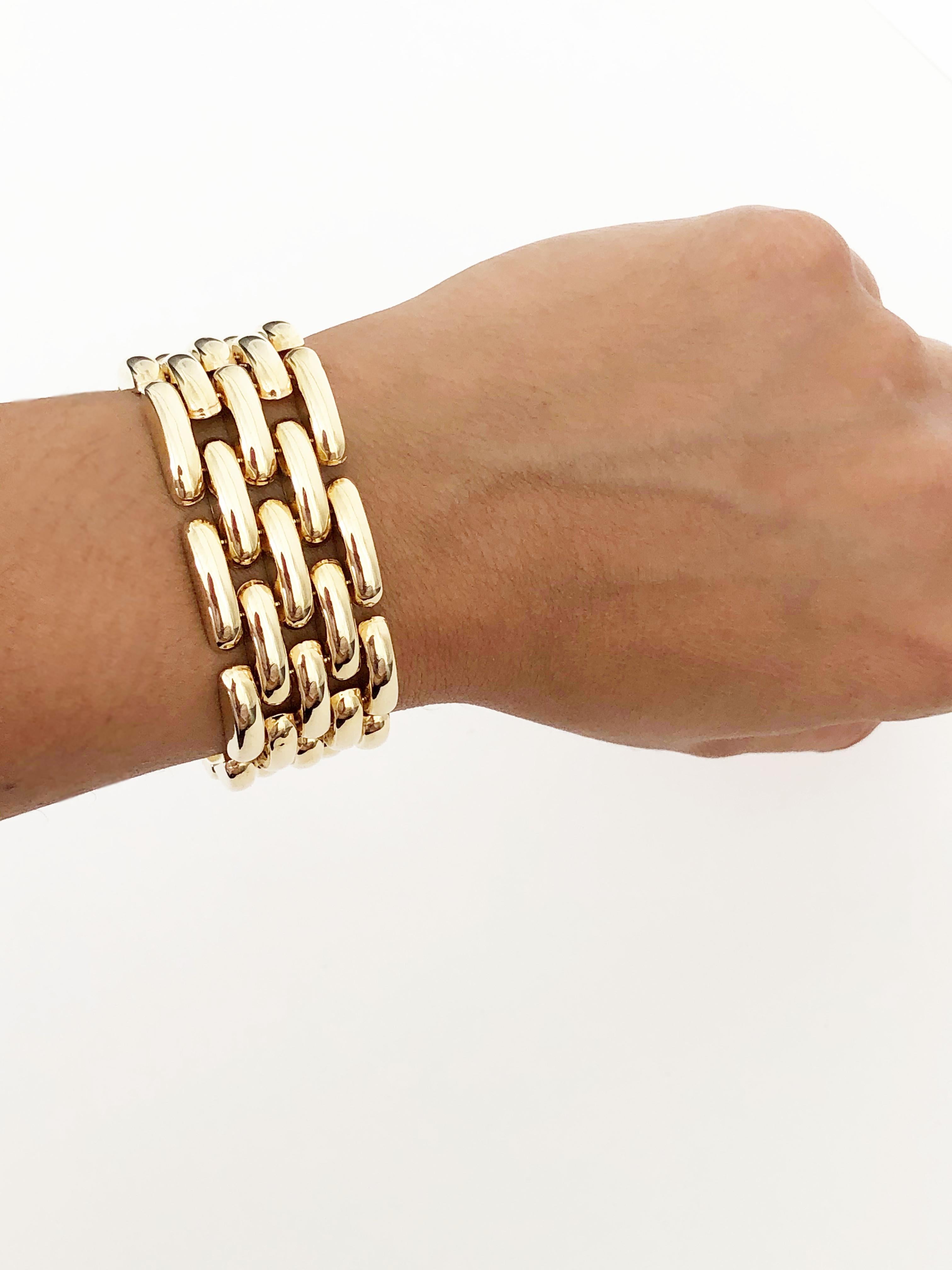 Beautiful yellow gold link bracelet handmade in 14k.  Estate piece in excellent condition.  Length 7.25 and 51.78 grams.  Perfect for a classic big look that you can stack or wear on it's own.