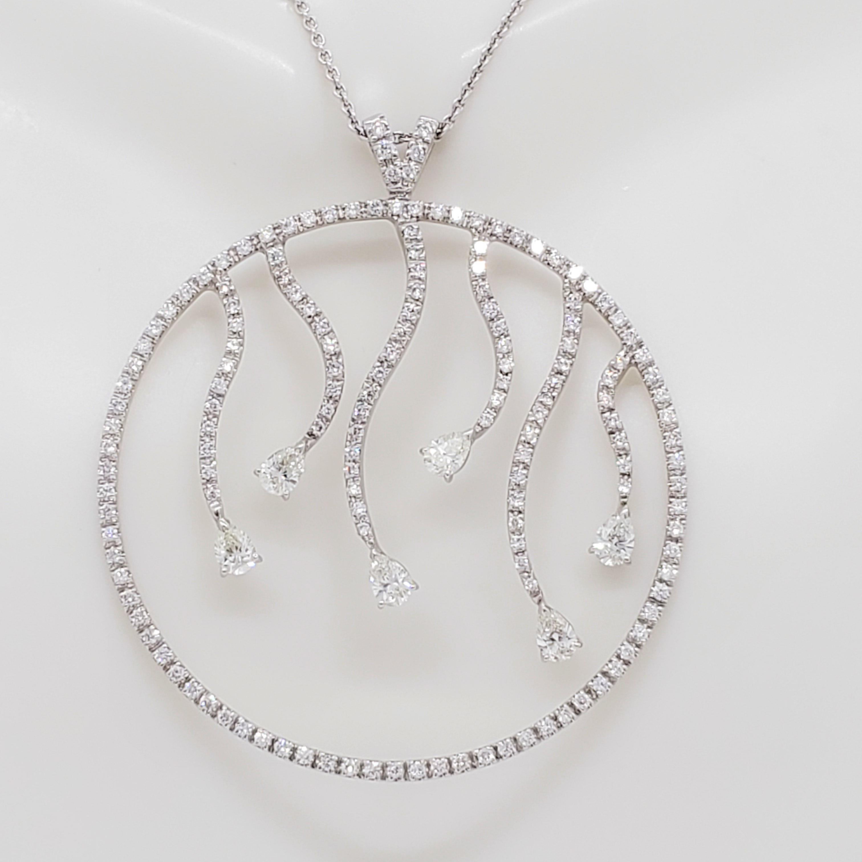 Gorgeous pendant necklace by Zydo with 3.00 ct. good quality, white, and bright diamond pear shapes and rounds.  Handmade mounting in 18k white gold.  Length is 18