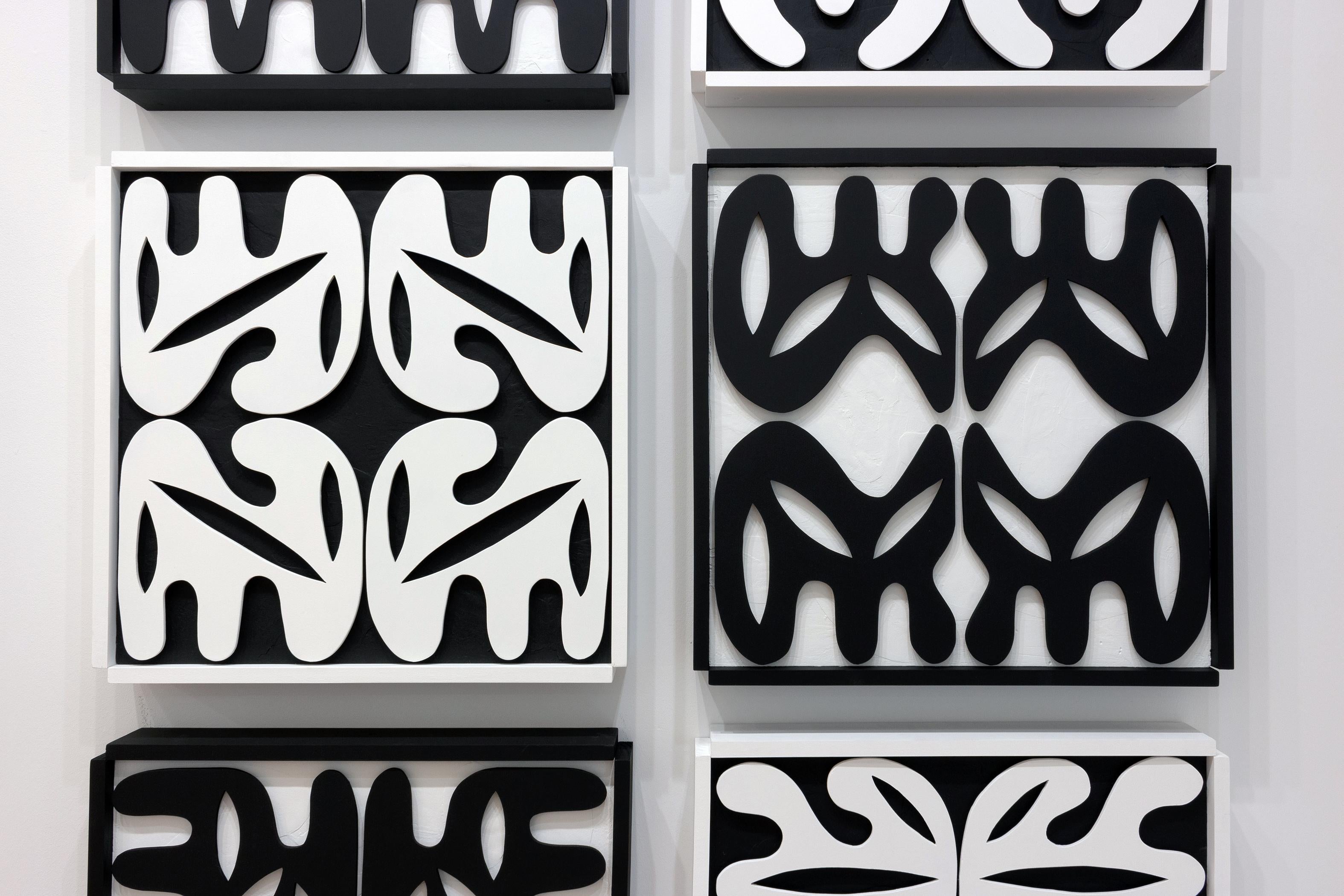 This large-scale multi piece work features organic and undulating wood-cut shapes. Black and white.

Colombian-born, Atlanta-based artist Esteban Patino creates paintings, collages, and sculptures that explore the multitudes of language creation and