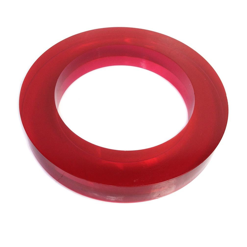 This is an Estée Lauder cranberry lucite bangle. This modern chic  translucent bangle is sliced with squared edges. It was part of an Estée Lauder advertising campaign in 2000. (Reference: Plastic Bangles by Lyn Tortoriello & Deborah