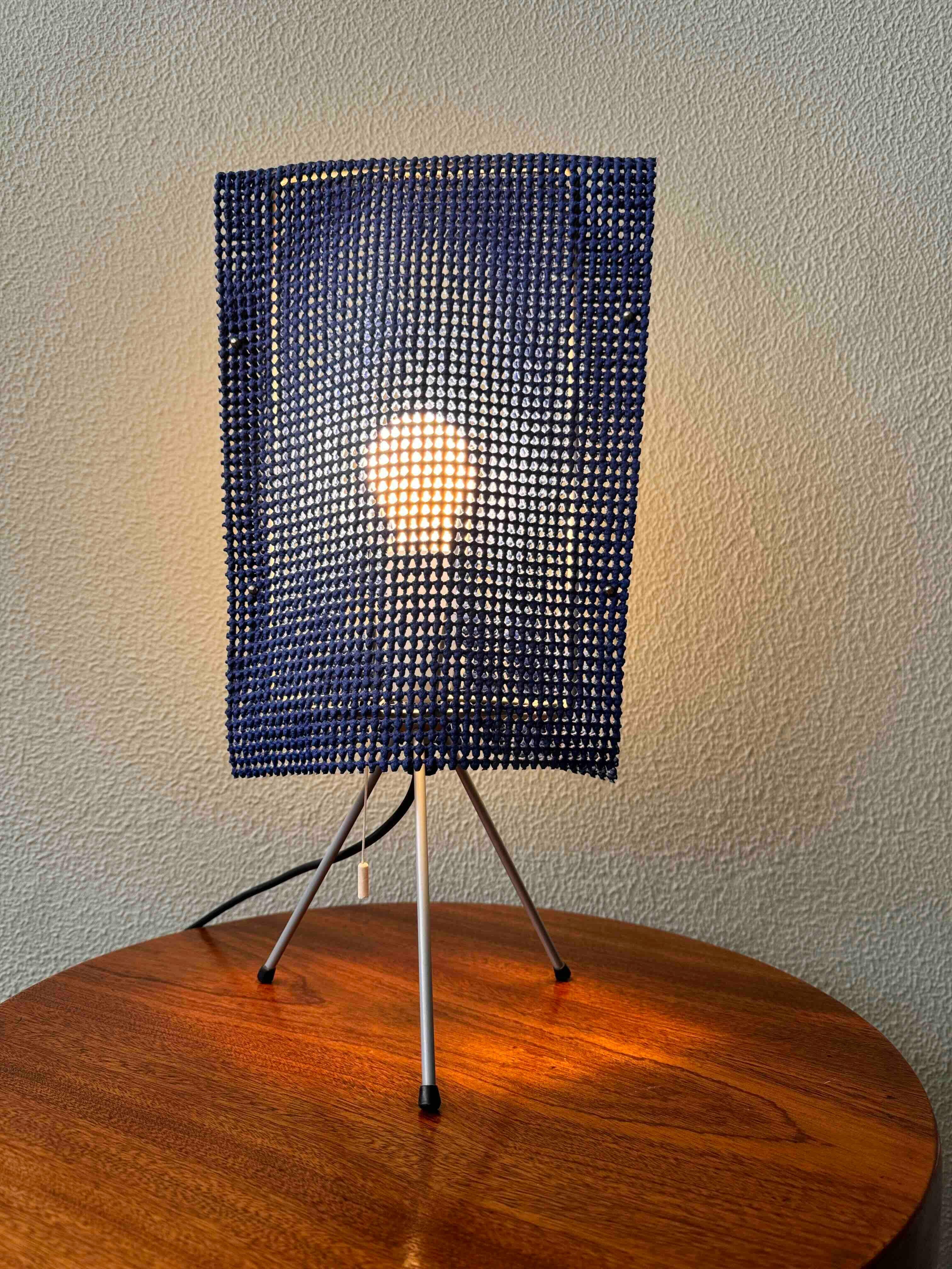  'Estela' table lamp by Campana Brothers for O-Luce, 1997

Introducing the Estela Lamp, an extraordinary piece of design history created by the renowned Brazilian designers Humberto & Fernando Campana. Produced by Oluce Milano in 1997, this lamp has