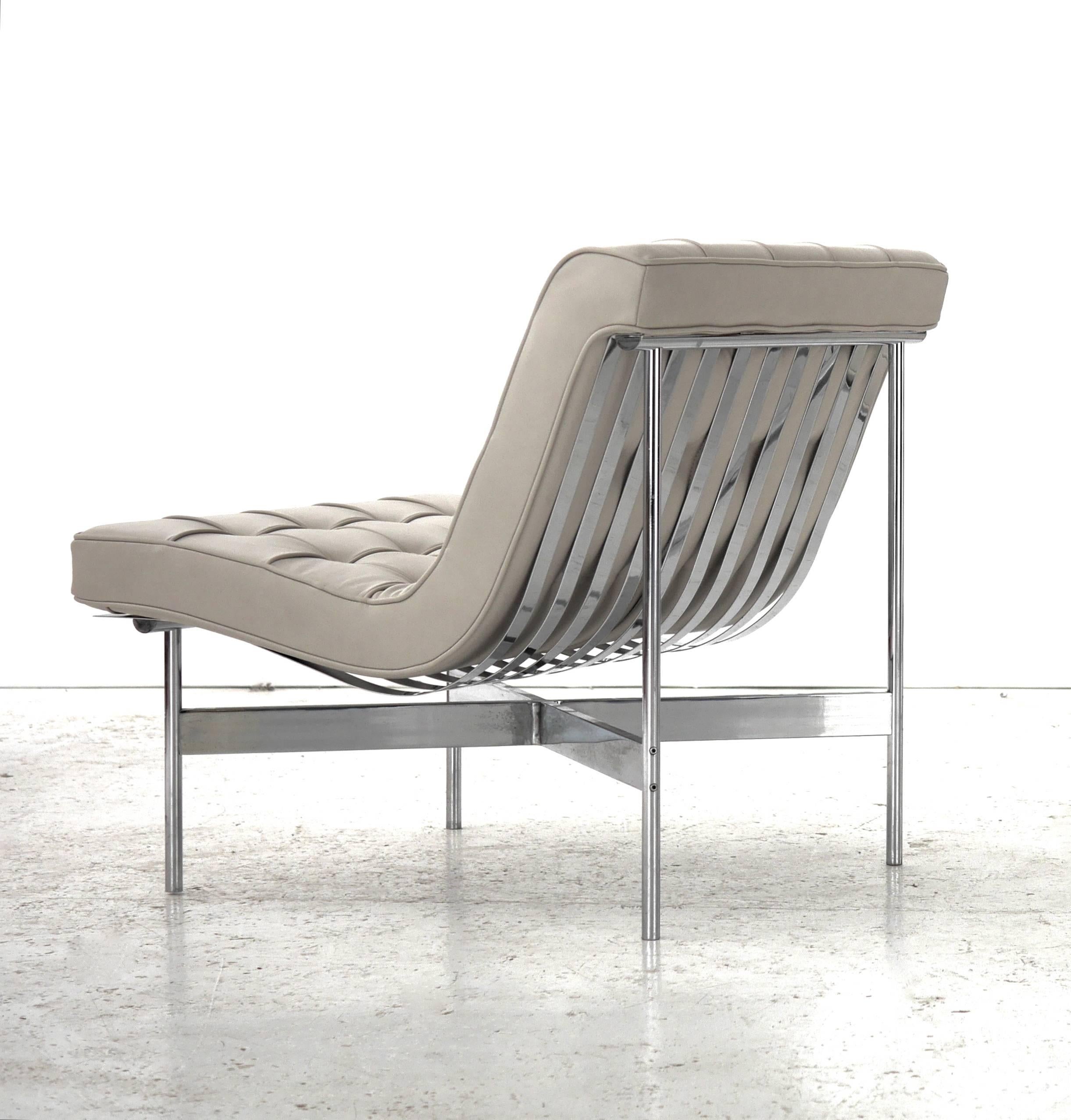 William Katavolos, Ross Littell and Douglas Kelley for Laverne model 5C lounge chair, 1953.
Recently reupholstered on a pale grey leather. Minor pitting on the chrome X braces.