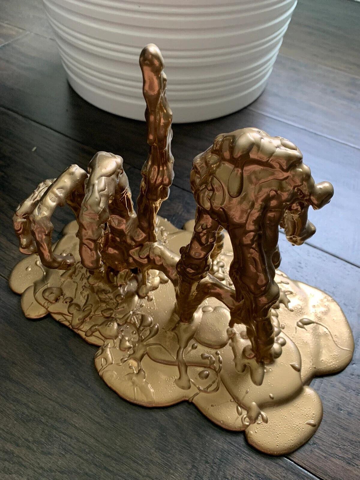 Introducing a rare and unique sculpture out of production, the one-of-a-kind LA Fingers by Jack of the Dust. This SFX grade liquid urethane casting resin sculpture features two skeleton hands throwing the iconic LA hand sign, popularized by the