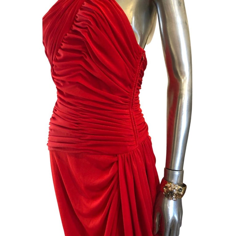 This dress is a draped work of art. One shoulder draped front bodice and draped front wrap. Designed by legendary Hollywood designer, Estevez. He designed for many celebrities both on and off screen, including Marilyn Monroe. US size 10, i think it