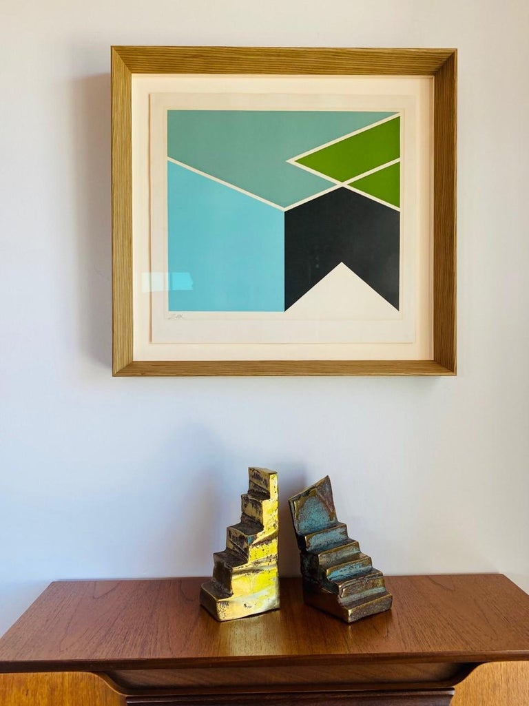 Beautiful pair of Esther Fuhrman (American, b. 1939) abstract modern bronze staircase bookends, one taller, the other wider. Tallest: 6.9