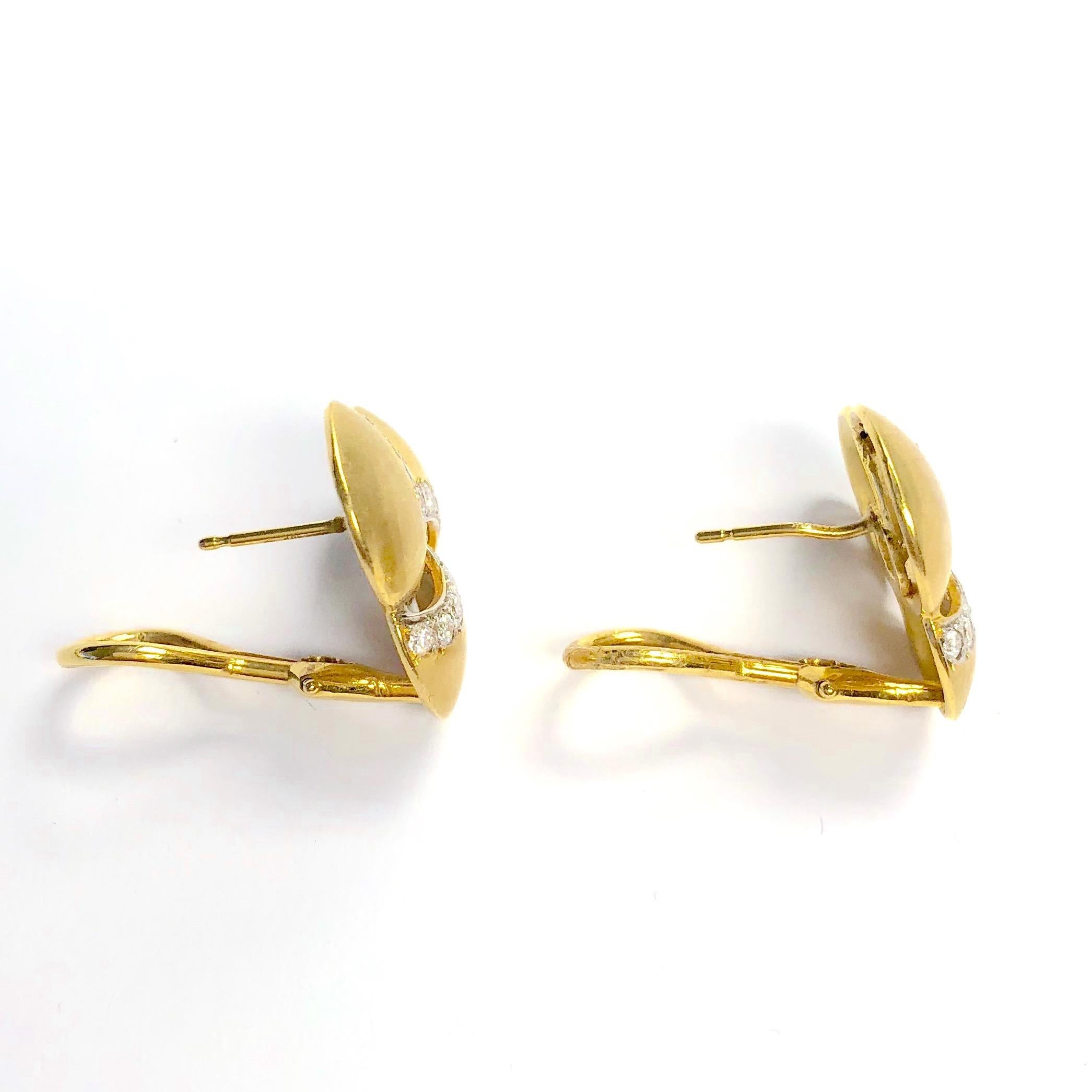 Classy 14K yellow gold and diamond earrings from California jewelry designer Esther Gallant. Satin finish, post and omega backs for extra security. Each earring measures 11/16